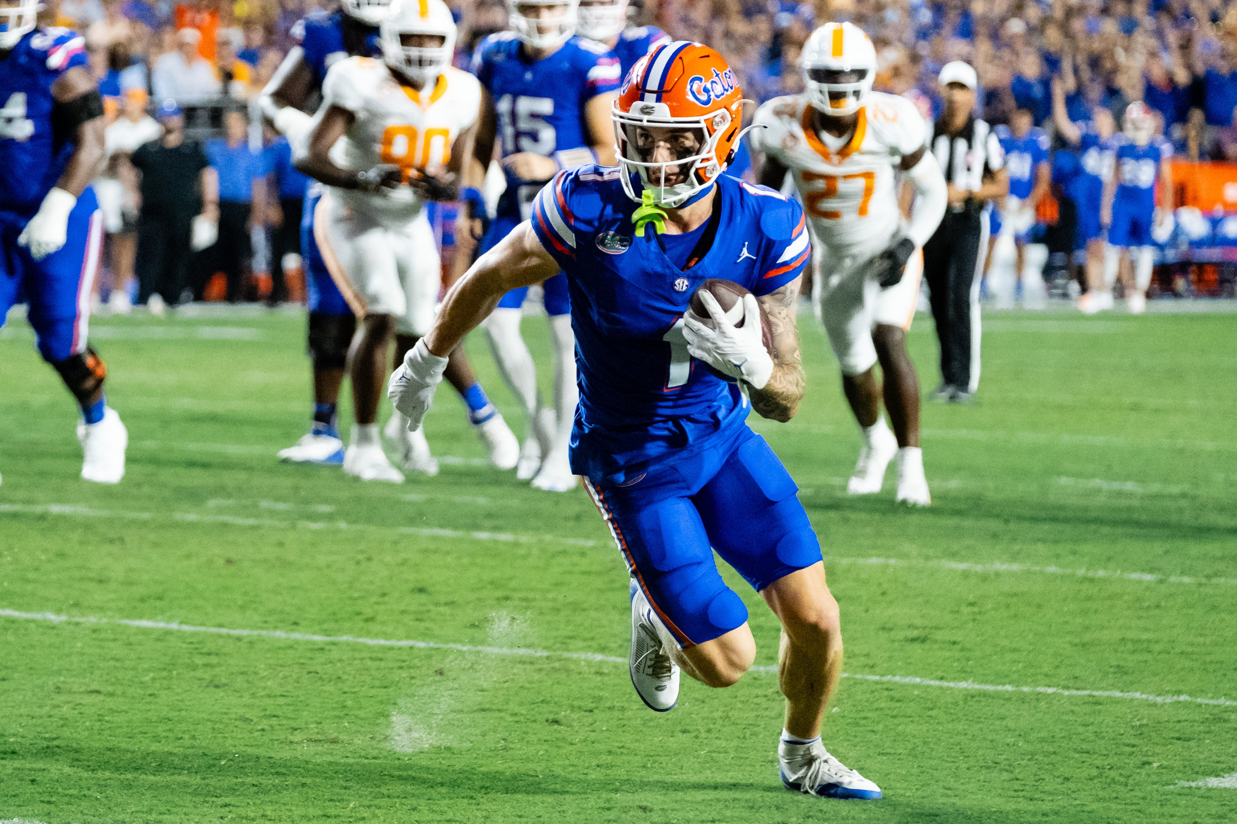 Sep 16, 2023; Gainesville, Florida, USA; Florida Gators wide receiver Ricky Pearsall (1) runs with the ball during the first half between the Florida Gators and Tennessee Volunteers at Ben Hill Griffin Stadium.