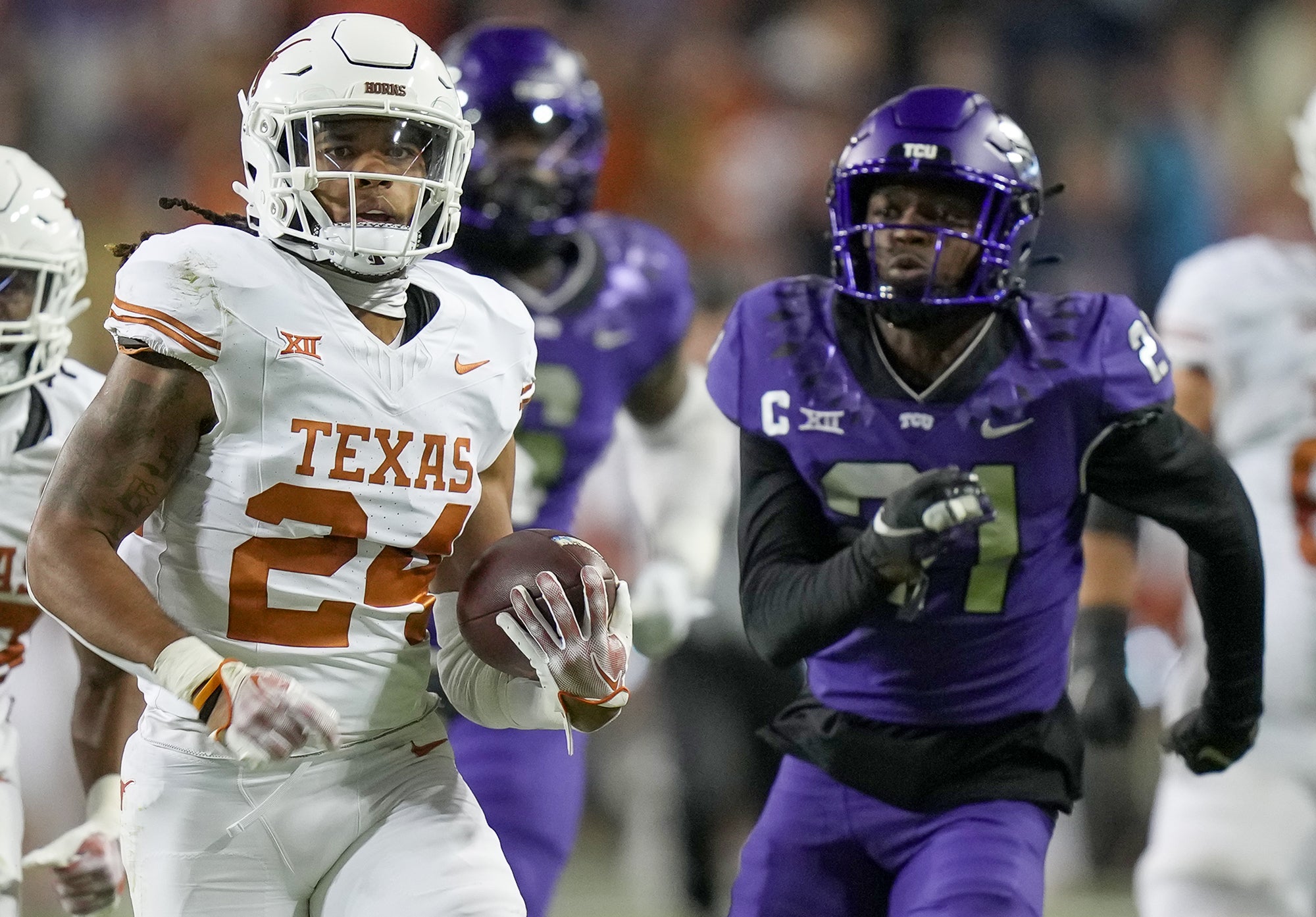 Nov 11, 2023; Fort Worth, Texas, USA; Texas Longhorns running back Jonathon Brooks (24) runs for the first down against TCU Horned Frogs in the first quarter of an NCAA college football game at Amon G. Carter Stadium. Mandatory Credit: Ricardo B. Brazziell-USA TODAY Sports