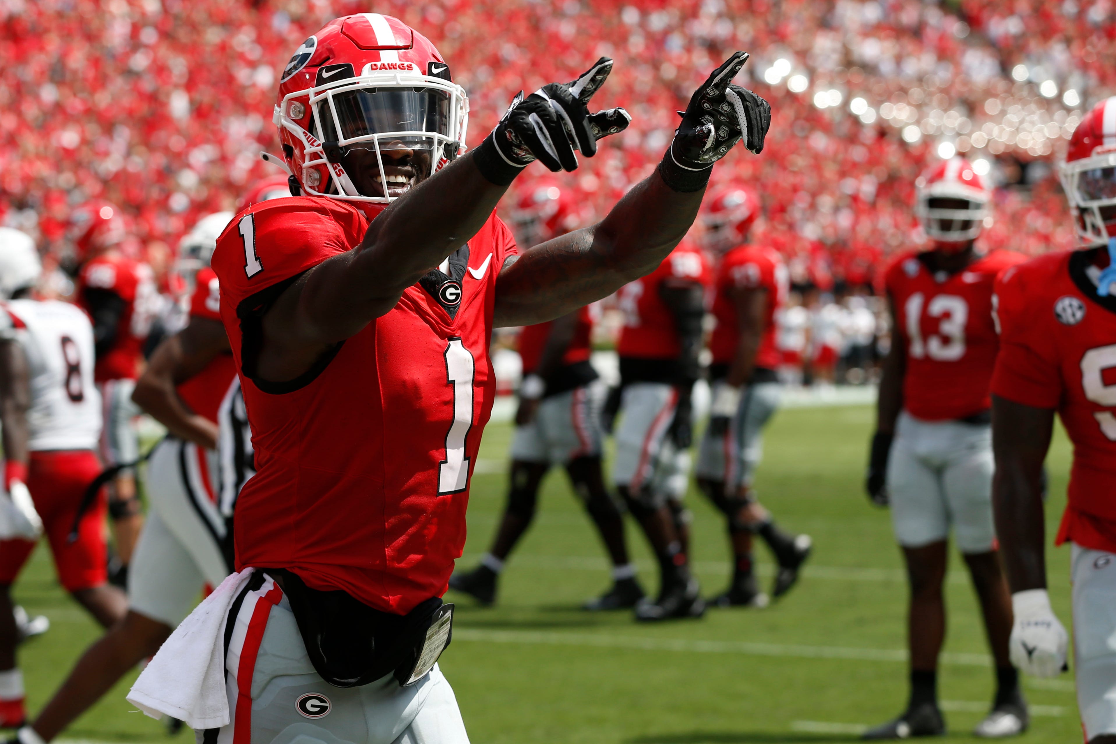 Georgia wide receiver Marcus Rosemy-Jacksaint (1) celebrates after scoring a touchdown during the first half of a NCAA college football game against Ball State in Athens, Ga., on Saturday, Sept. 9, 20.