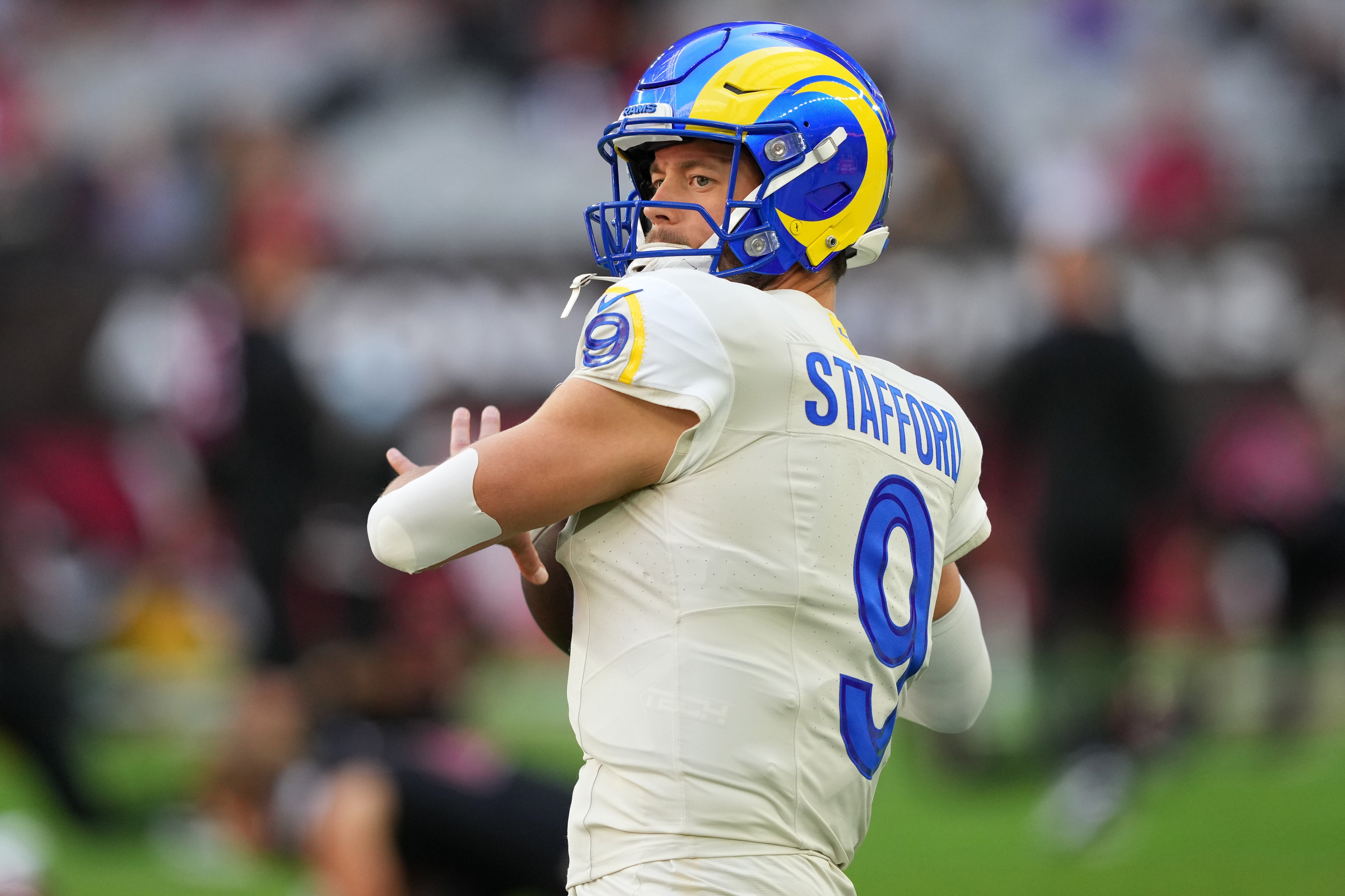 Nov 26, 2023; Glendale, Arizona, USA; Los Angeles Rams quarterback Matthew Stafford (9) warms up prior to facing the Arizona Cardinals at State Farm Stadium. Mandatory Credit: Joe Camporeale-USA TODAY Sports