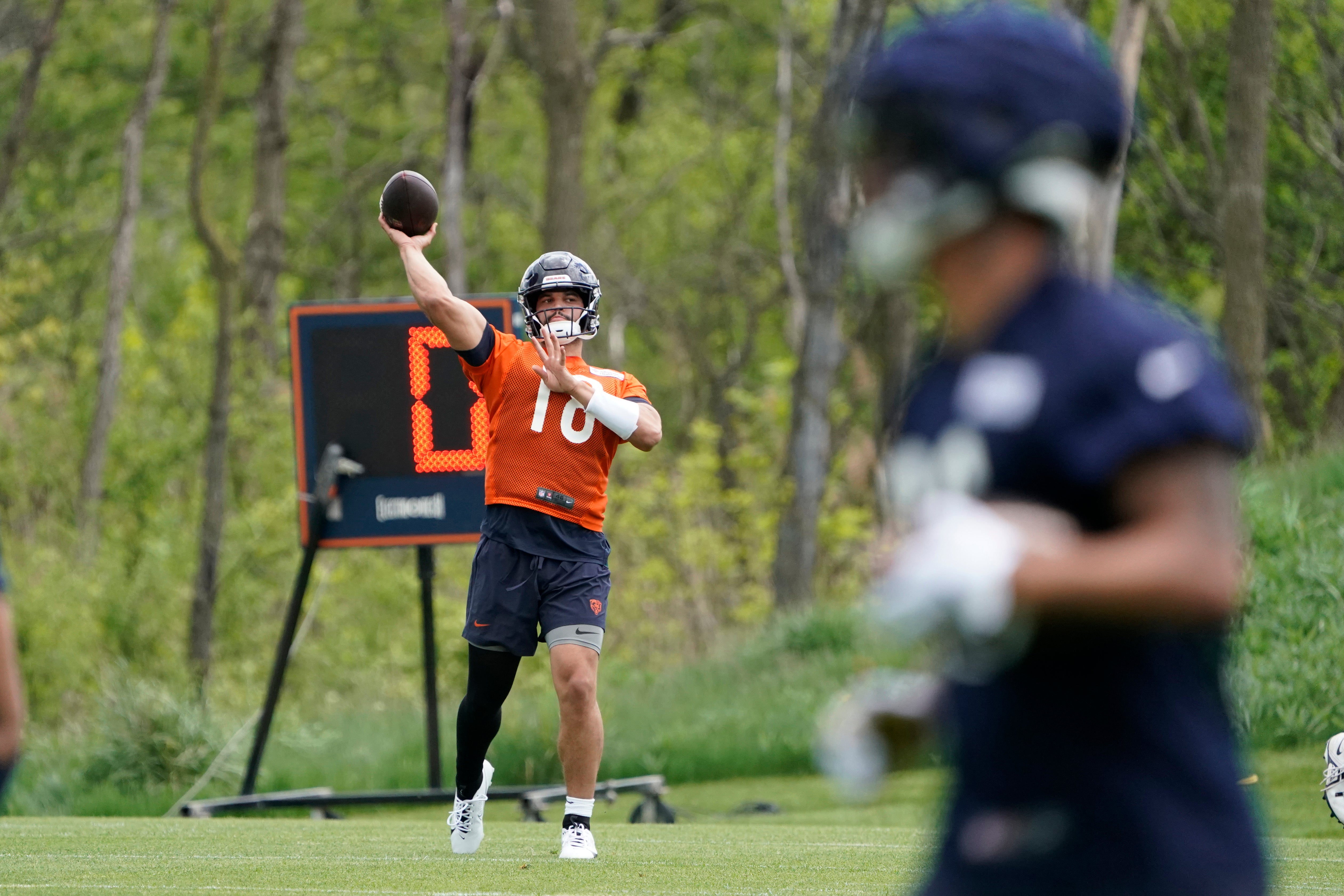 May 10, 2024; Lake Forest, IL, USA; Chicago Bears quarterback Caleb Williams throws the ball during Chicago Bears rookie minicamp at Halas Hall.