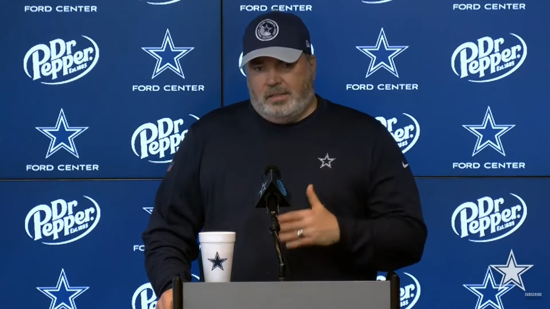 Dallas Cowboys head coach Mike McCarthy talks to reporters about Ezekiel Elliott during rookie minicamp.