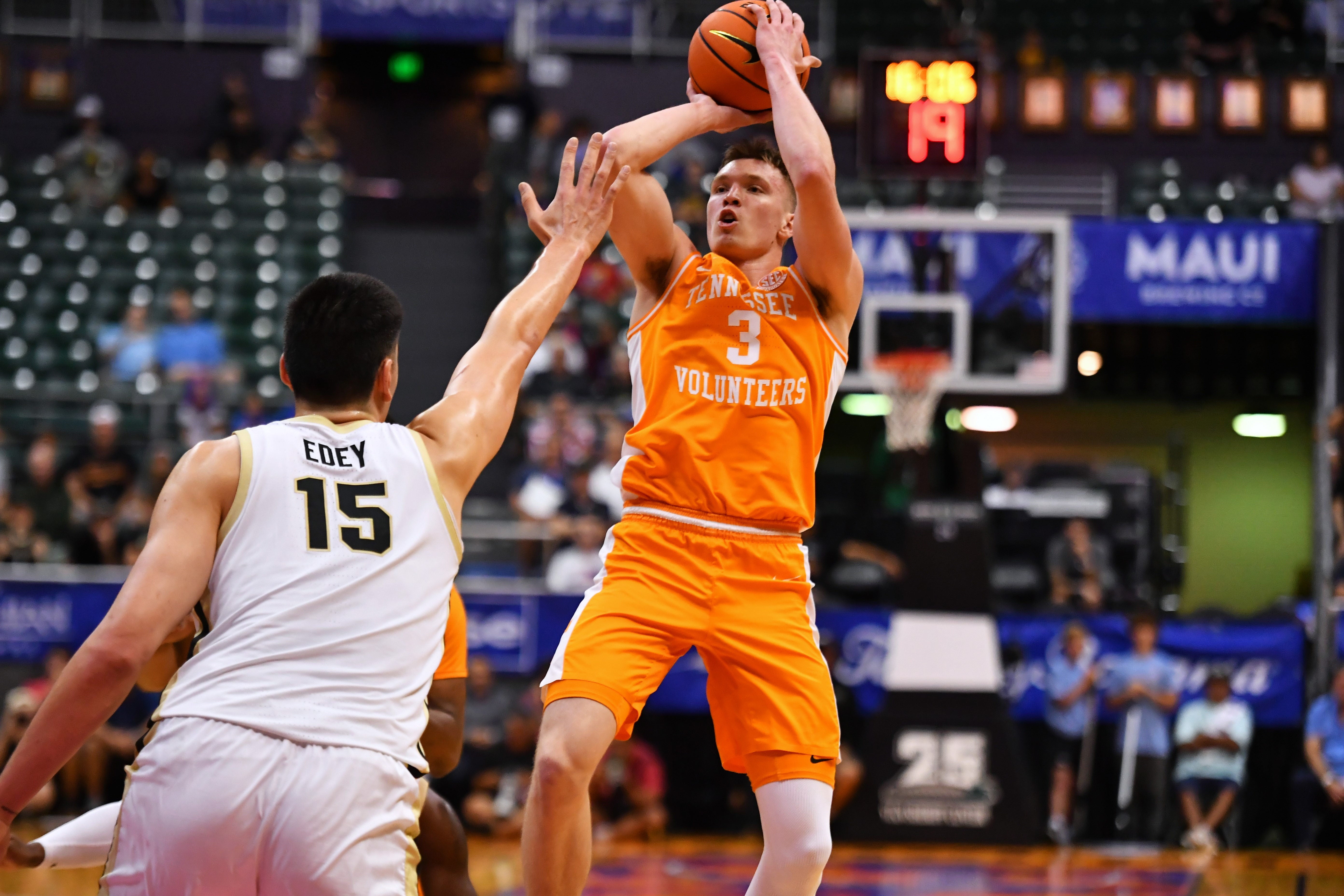 Nov 21, 2023; Honolulu, HI, USA; Tennessee Volunteers guard Dalton Knecht (3) attempts a shot defended by Purdue Boilermakers center Zach Edey (15) during the first period at SimpliFi Arena at Stan Sheriff Center.