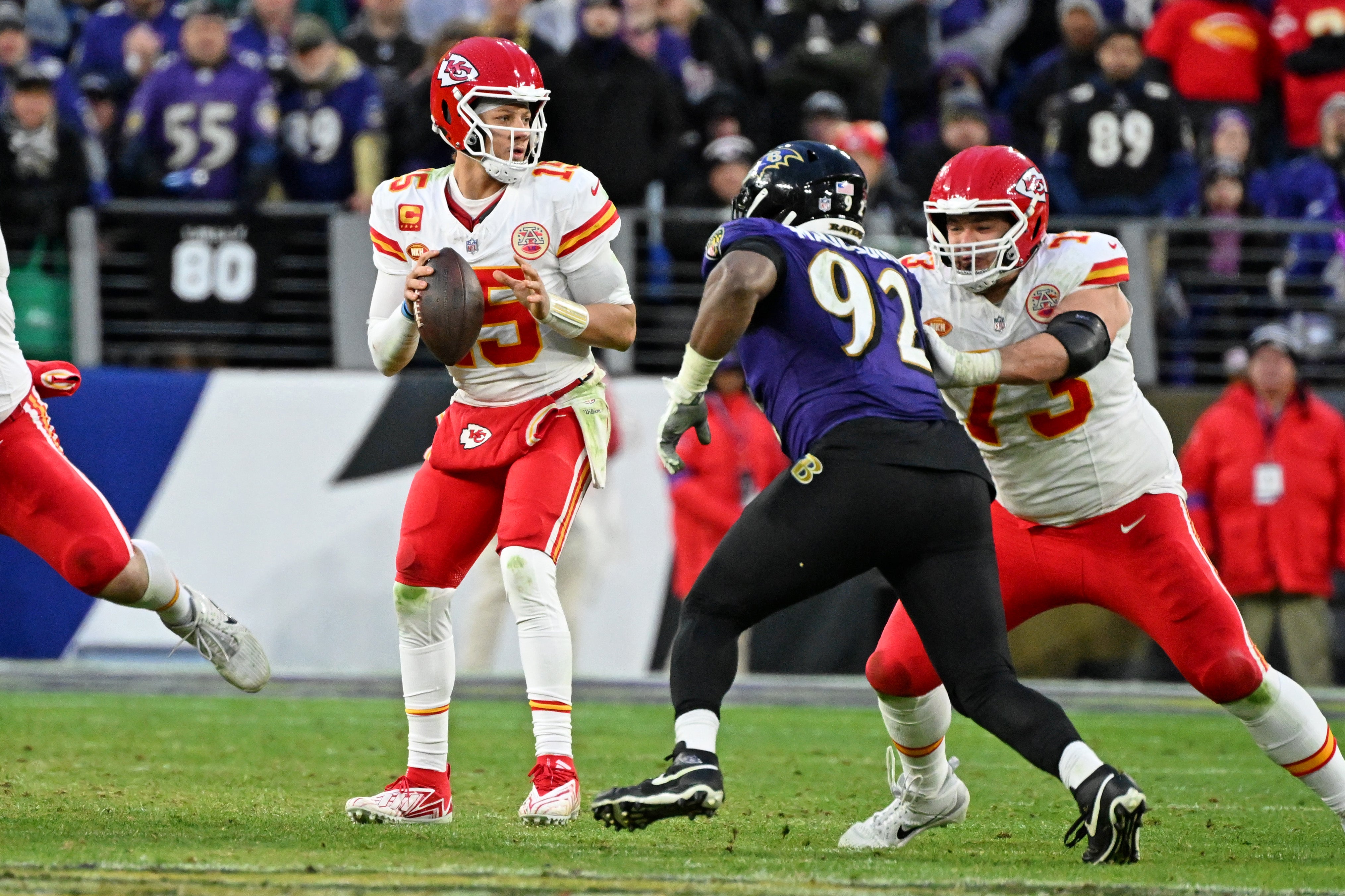 Jan 28, 2024; Baltimore, Maryland, USA; Kansas City Chiefs quarterback Patrick Mahomes (15) looks to pass the ball against the Baltimore Ravens during the second half in the AFC Championship football game at M&T Bank Stadium.