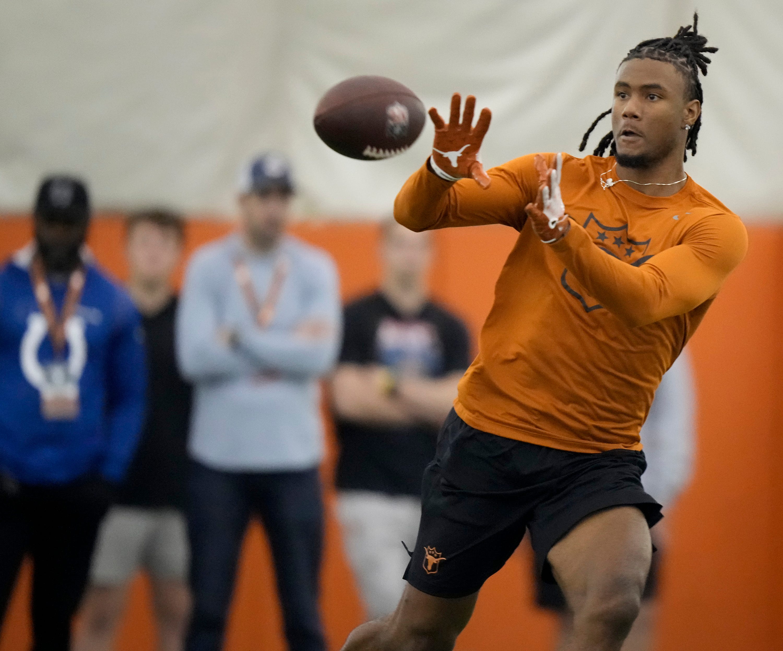Wide receiver Adonai Mitchell goes through drills at Texas Longhorns Football Pro Day at Frank Denius Fields Wednesday March 20, 2024.