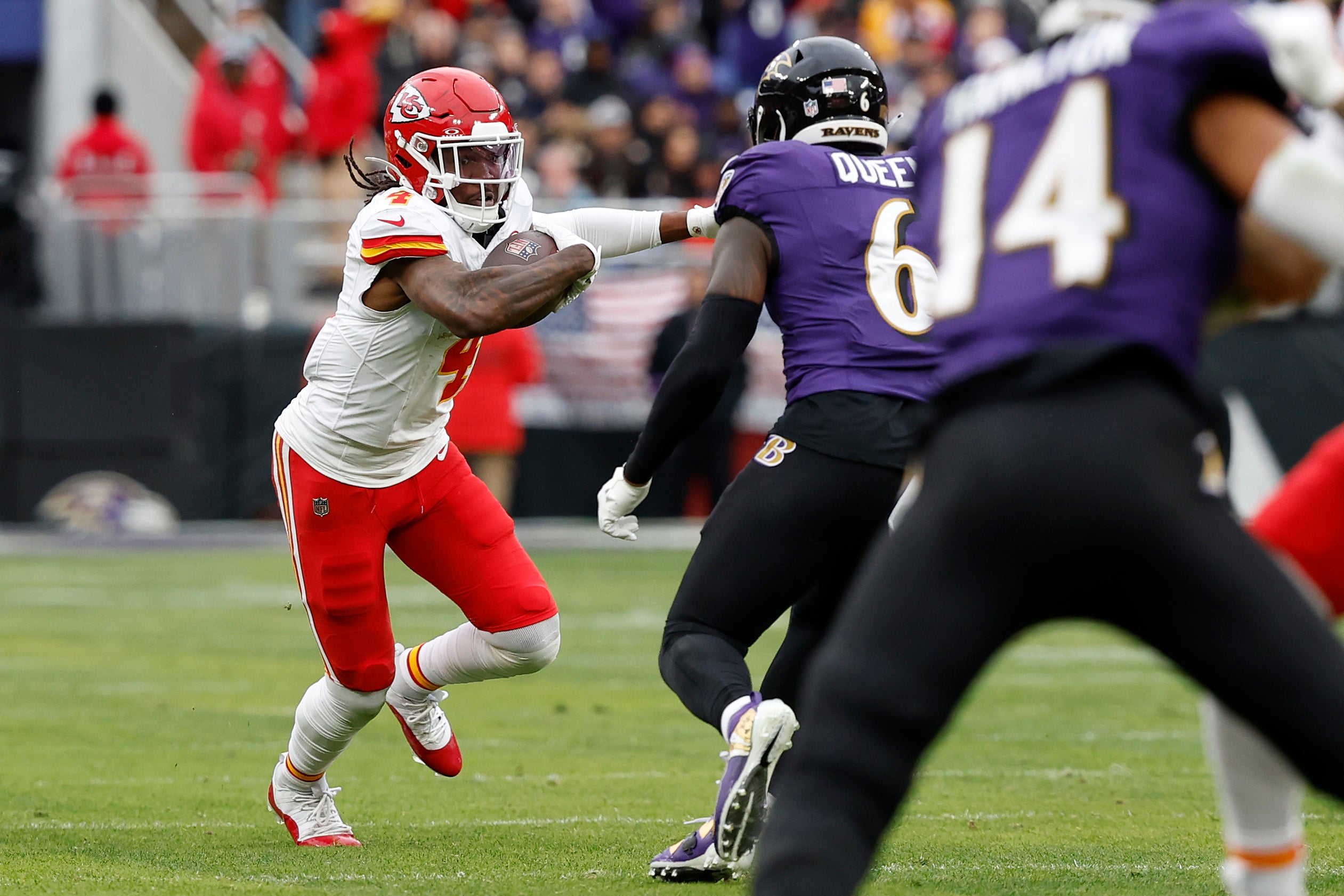 Jan 28, 2024; Baltimore, Maryland, USA; Kansas City Chiefs wide receiver Rashee Rice (4) carries the ball as Baltimore Ravens linebacker Patrick Queen (6) defends during the first half in the AFC Championship football game at M&T Bank Stadium.