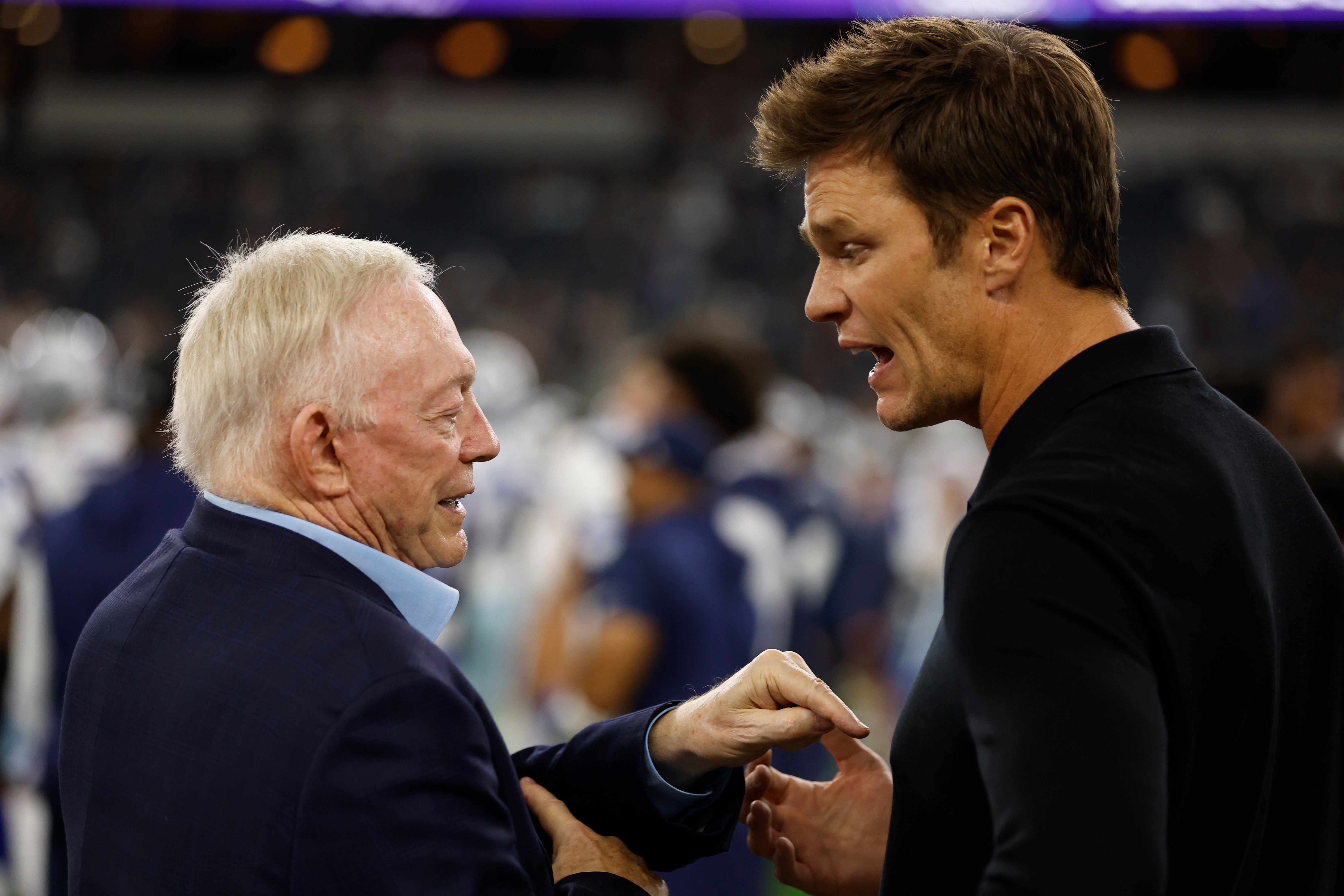 Aug 26, 2023; Arlington, Texas, USA; Dallas Cowboys owner Jerry Jones (L) talks to former NFL player Tom Brady (R) before the game against the Las Vegas Raiders at AT&T