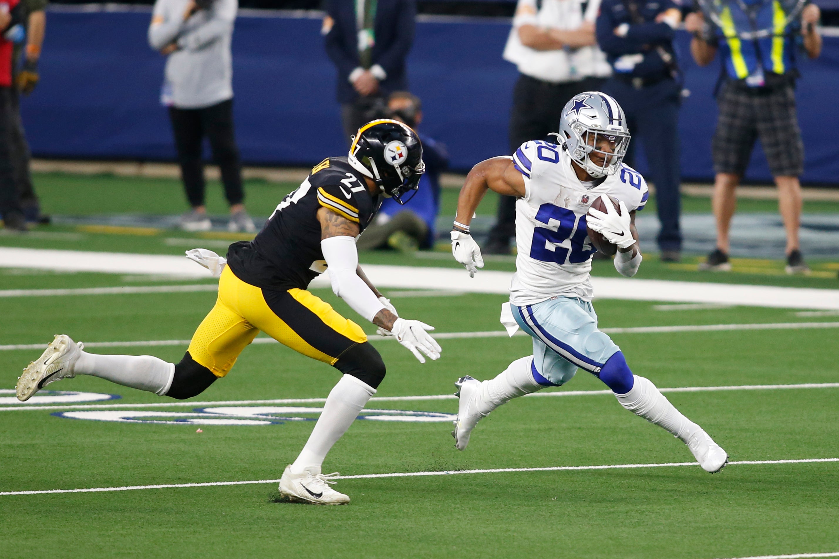 Nov 8, 2020; Arlington, Texas, USA; Dallas Cowboys running back Tony Pollard (20) runs the ball against Pittsburgh Steelers safety Marcus Allen (27) in the third quarter at AT&T Stadium. Mandatory Credit: Tim Heitman-USA TODAY Sports  