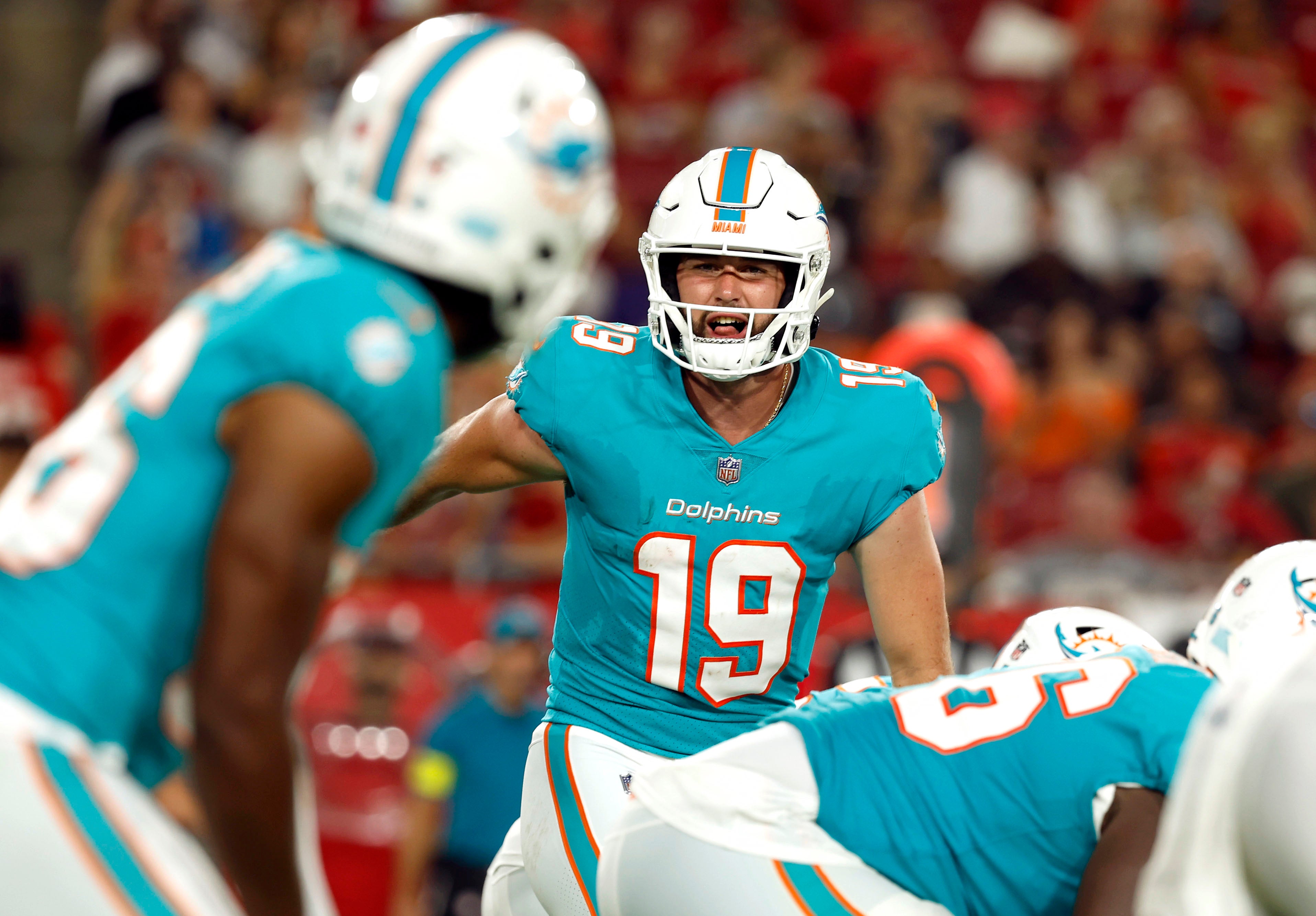 Aug 13, 2022; Tampa, Florida, USA; Miami Dolphins quarterback Skylar Thompson (19) audibles against the Tampa Bay Buccaneers during the second half at Raymond James Stadium.