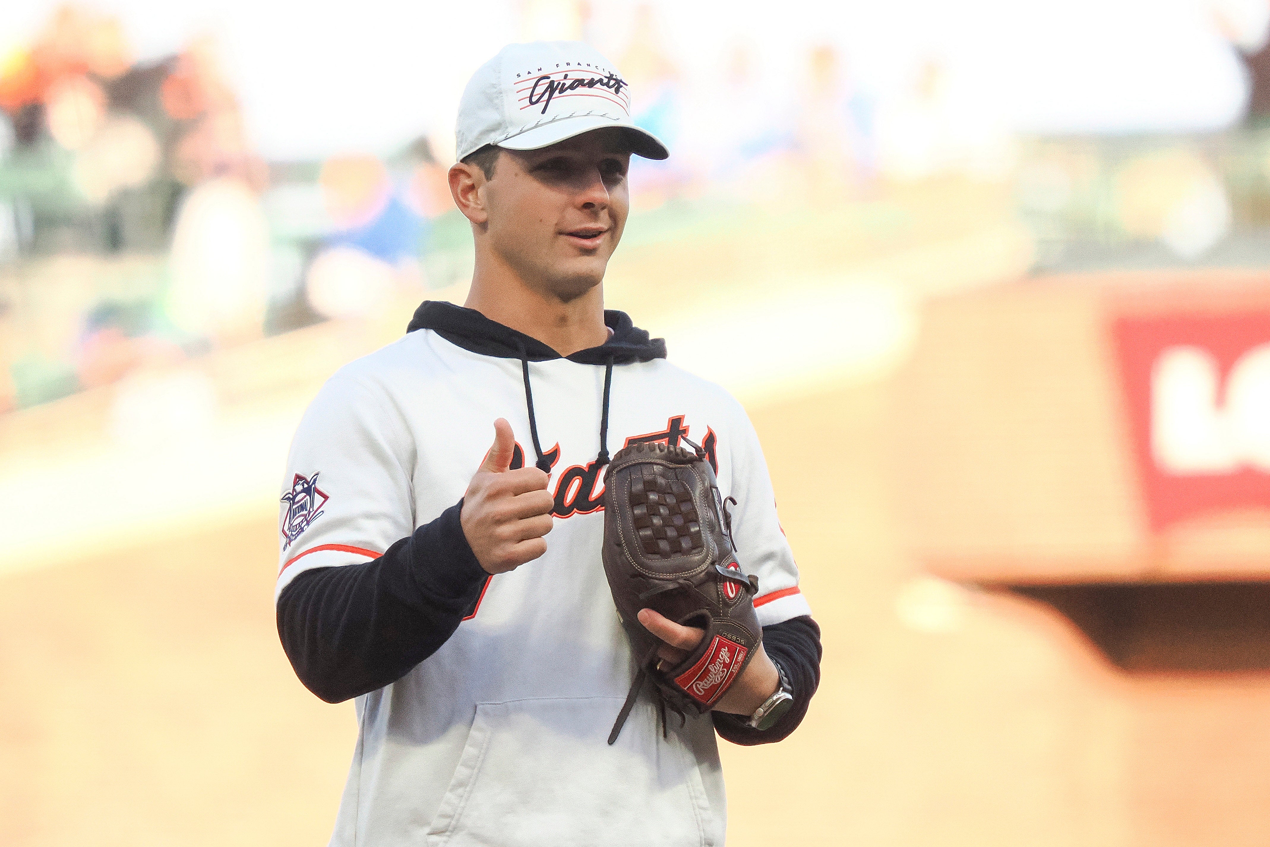 May 14, 2024; San Francisco, California, USA; San Francisco 49ers quarterback Brock Purdy prepares to throw the ceremonial first pitch before the game between the San Francisco Giants and Los Angeles Dodgers at Oracle Park.