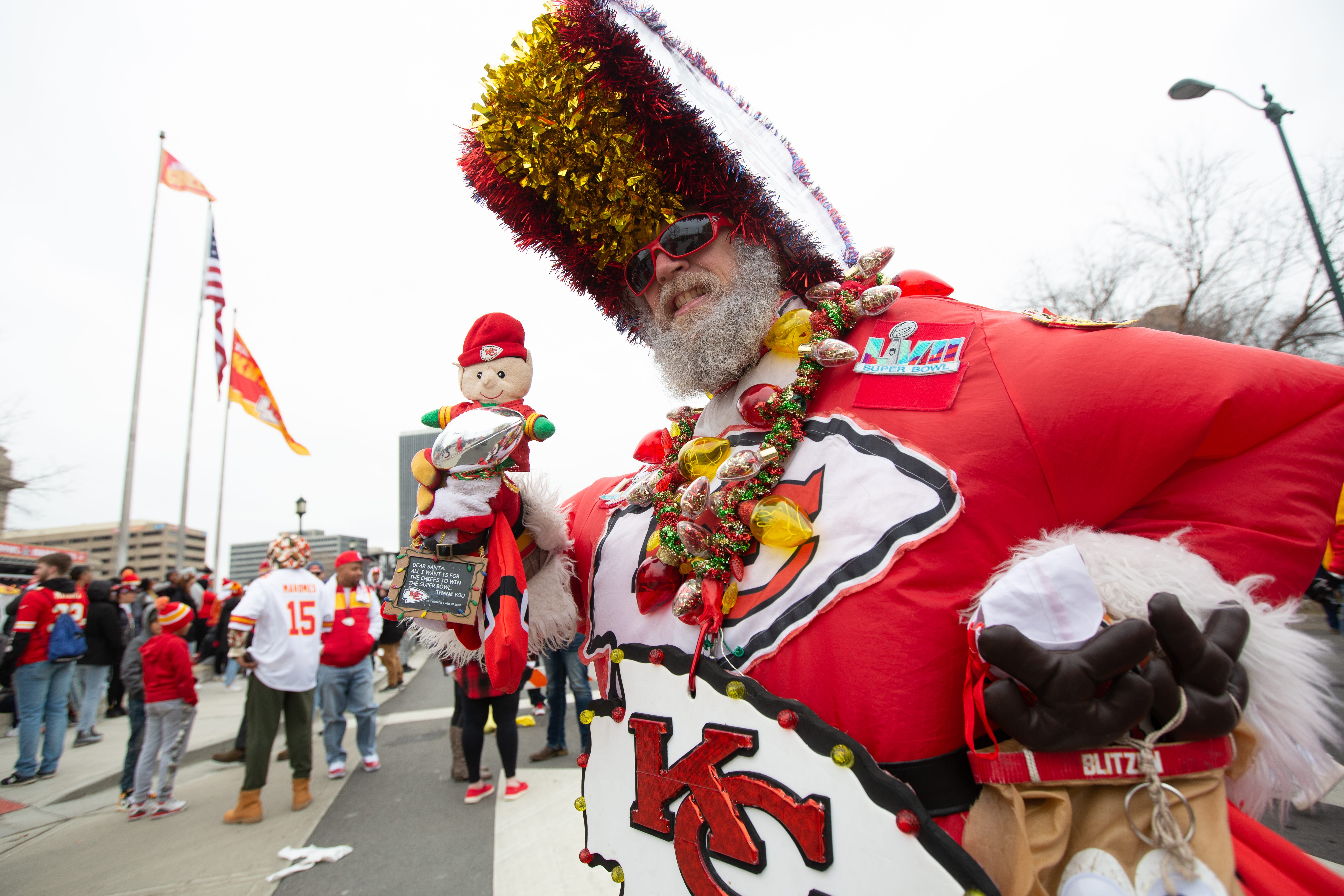 Don Lobmeyer shows off his Christmas-themed Chiefs outfit before the start of Wednesday's Super Bowl LVII parade in downtown Kansas City, Missouri.  