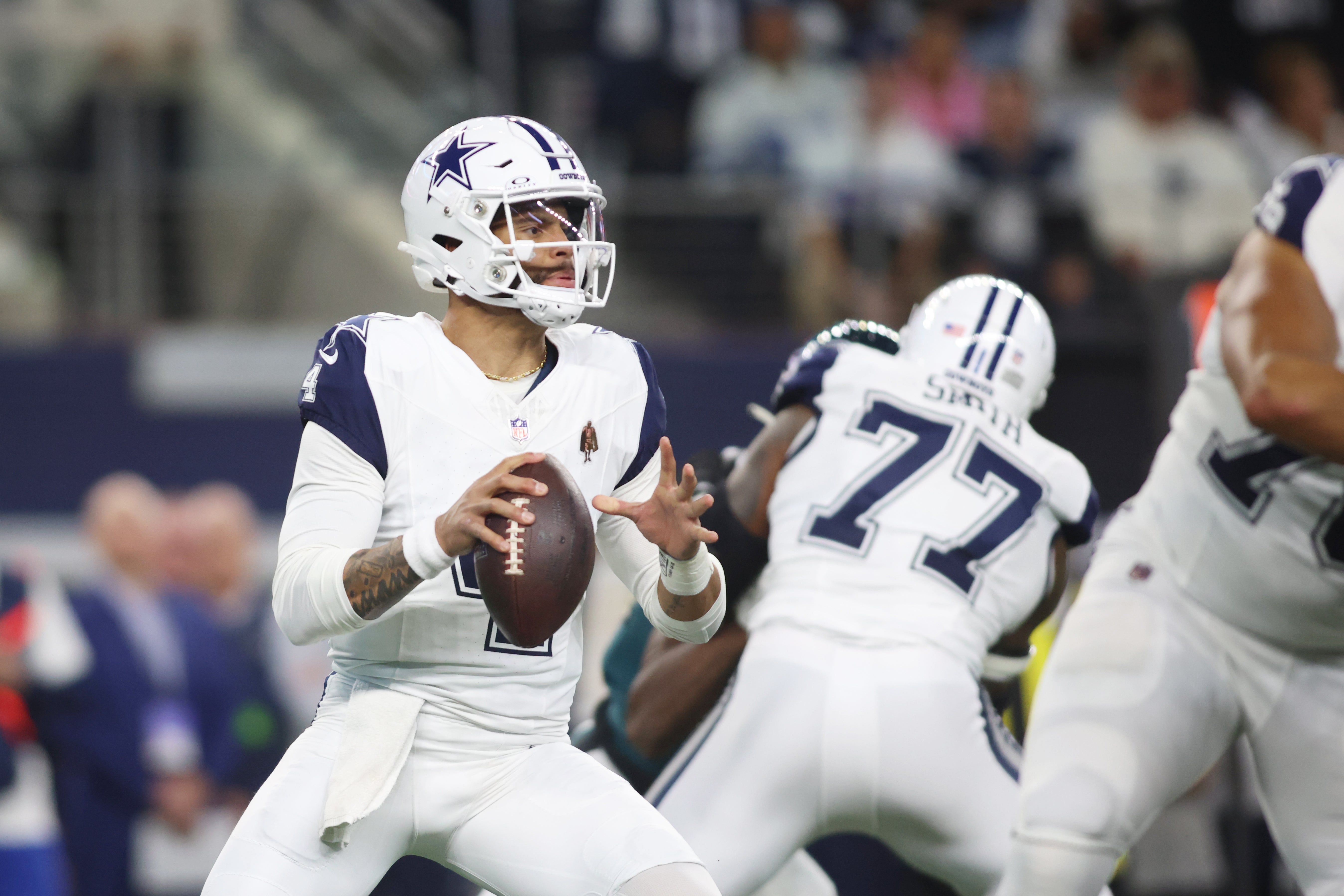 Dallas Cowboys quarterback Dak Prescott (4) throws a pass in the first quarter against the Philadelphia Eagles at AT&T Stadium.