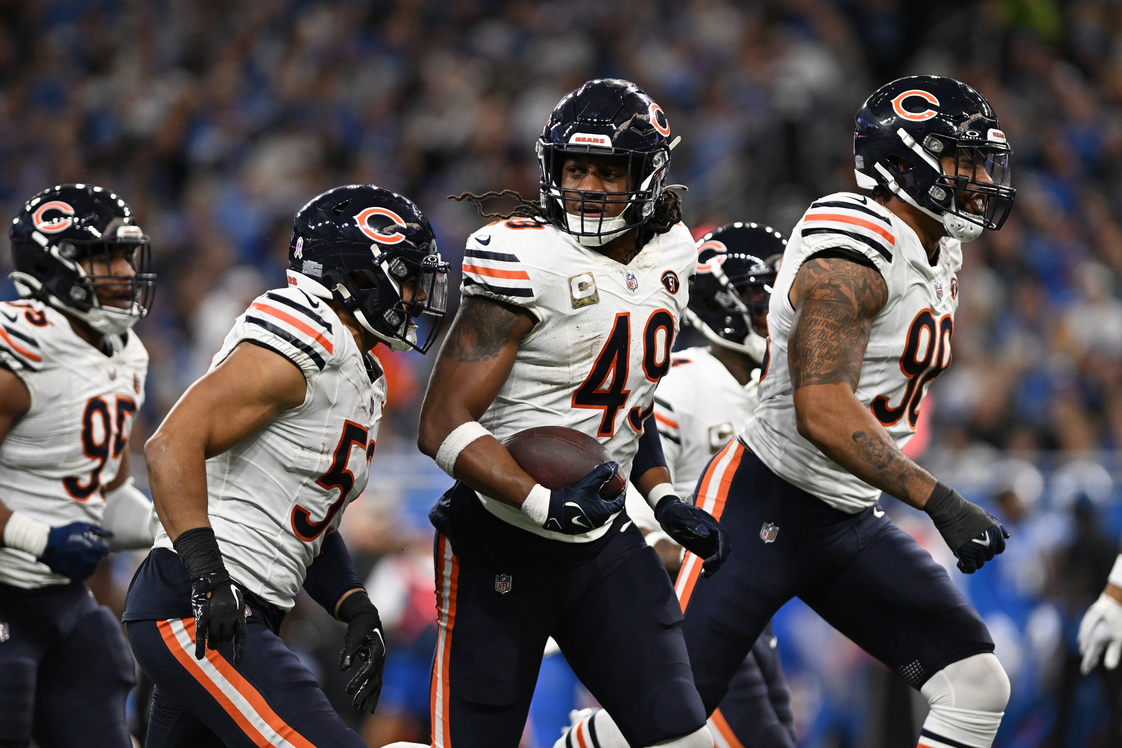 Nov 19, 2023; Detroit, Michigan, USA; Chicago Bears linebacker Tremaine Edmunds (49) celebrates with teammates after intercepting a pass against the Detroit Lions in the third quarter at Ford Field.