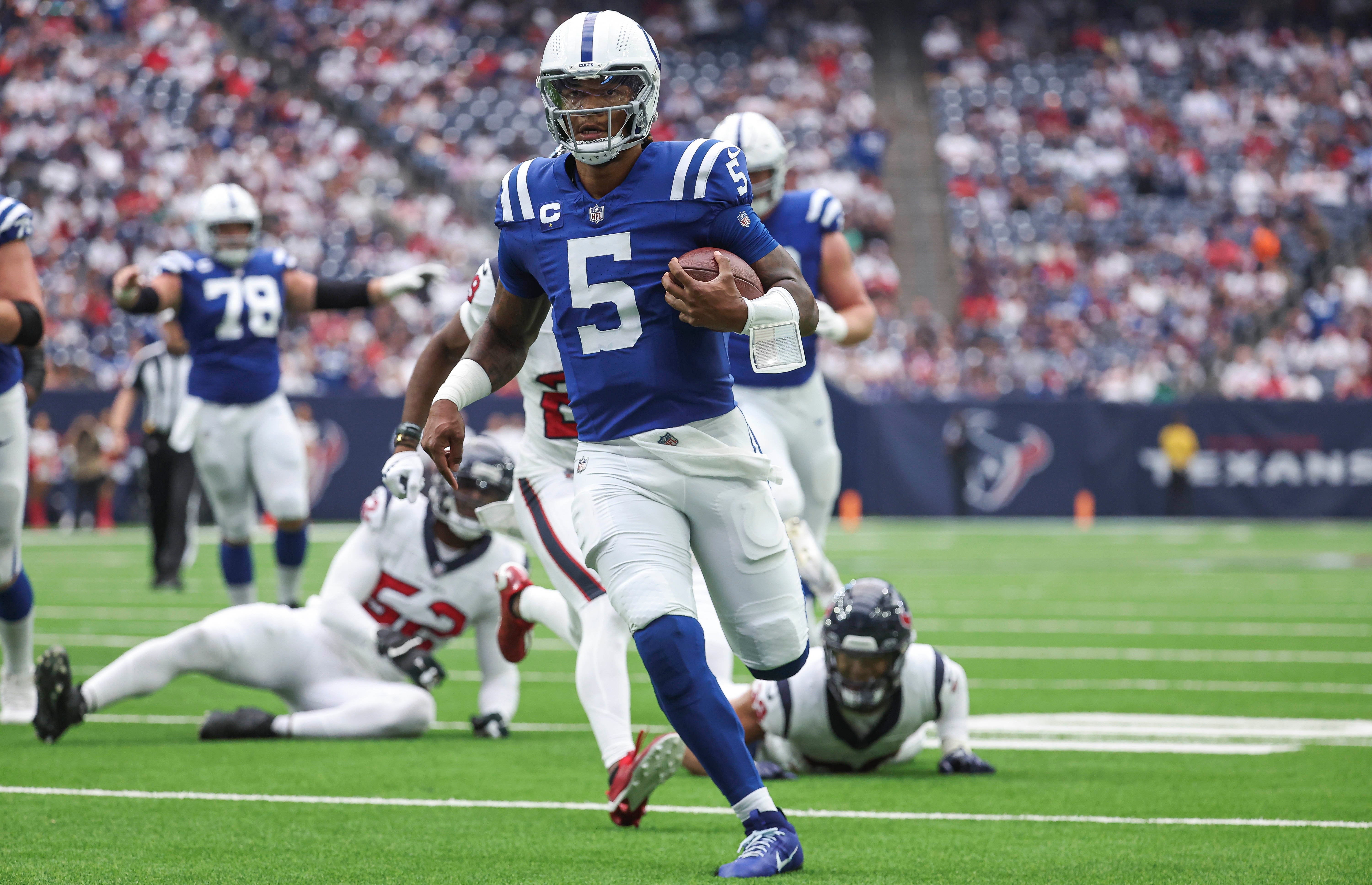 Sep 17, 2023; Houston, Texas, USA; Indianapolis Colts quarterback Anthony Richardson (5) runs with the ball for a touchdown during the first quarter against the Houston Texans at NRG Stadium.