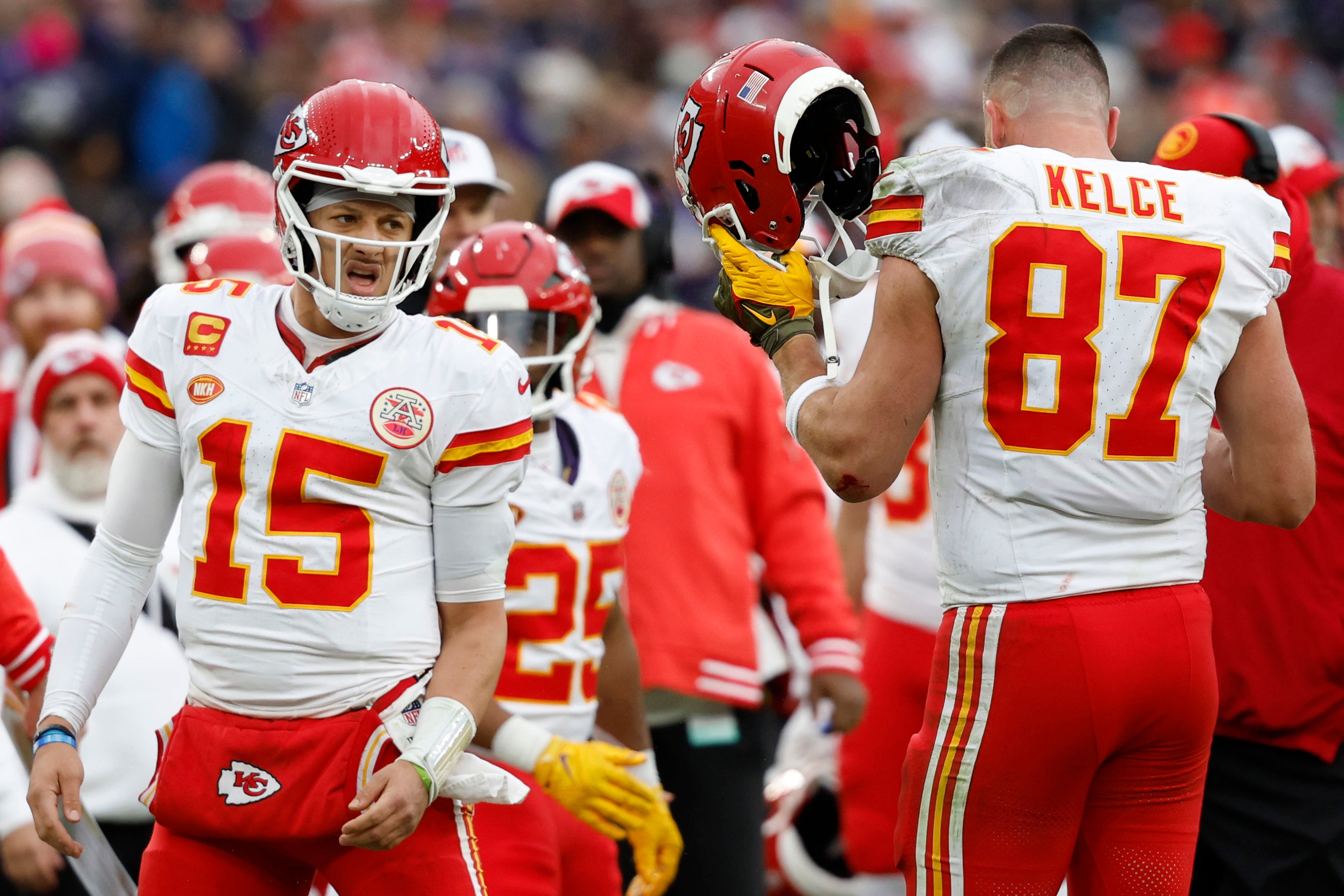 Jan 28, 2024; Baltimore, Maryland, USA; Kansas City Chiefs quarterback Patrick Mahomes (15) celebrates with Chiefs tight end Travis Kelce (87) after a touchdown against the Baltimore Ravens in the AFC Championship football game at M&T Bank Stadium.