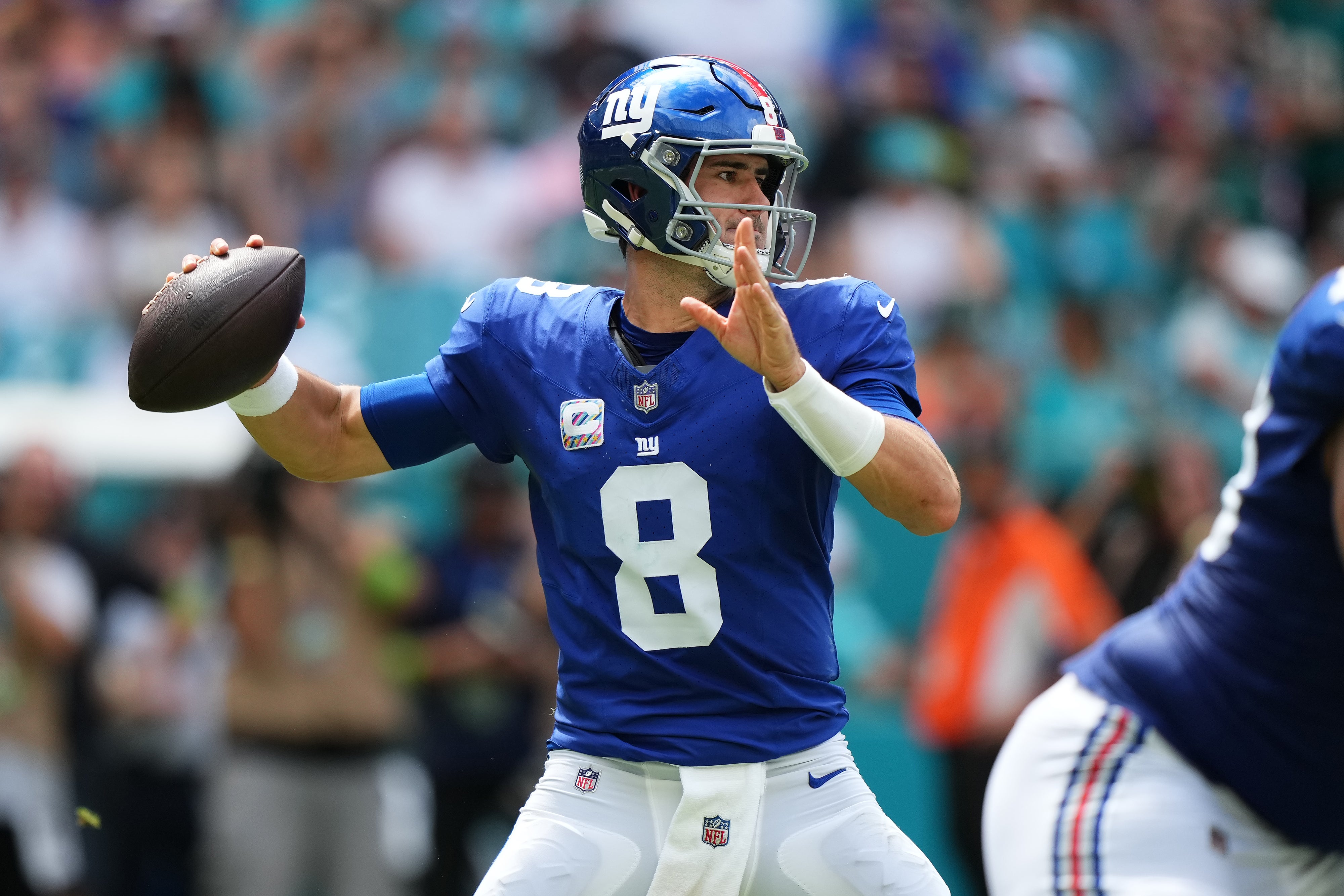 Oct 8, 2023; Miami Gardens, Florida, USA; New York Giants quarterback Daniel Jones (8) attempts a pass agianst the Miami Dolphins during the first half at Hard Rock Stadium.