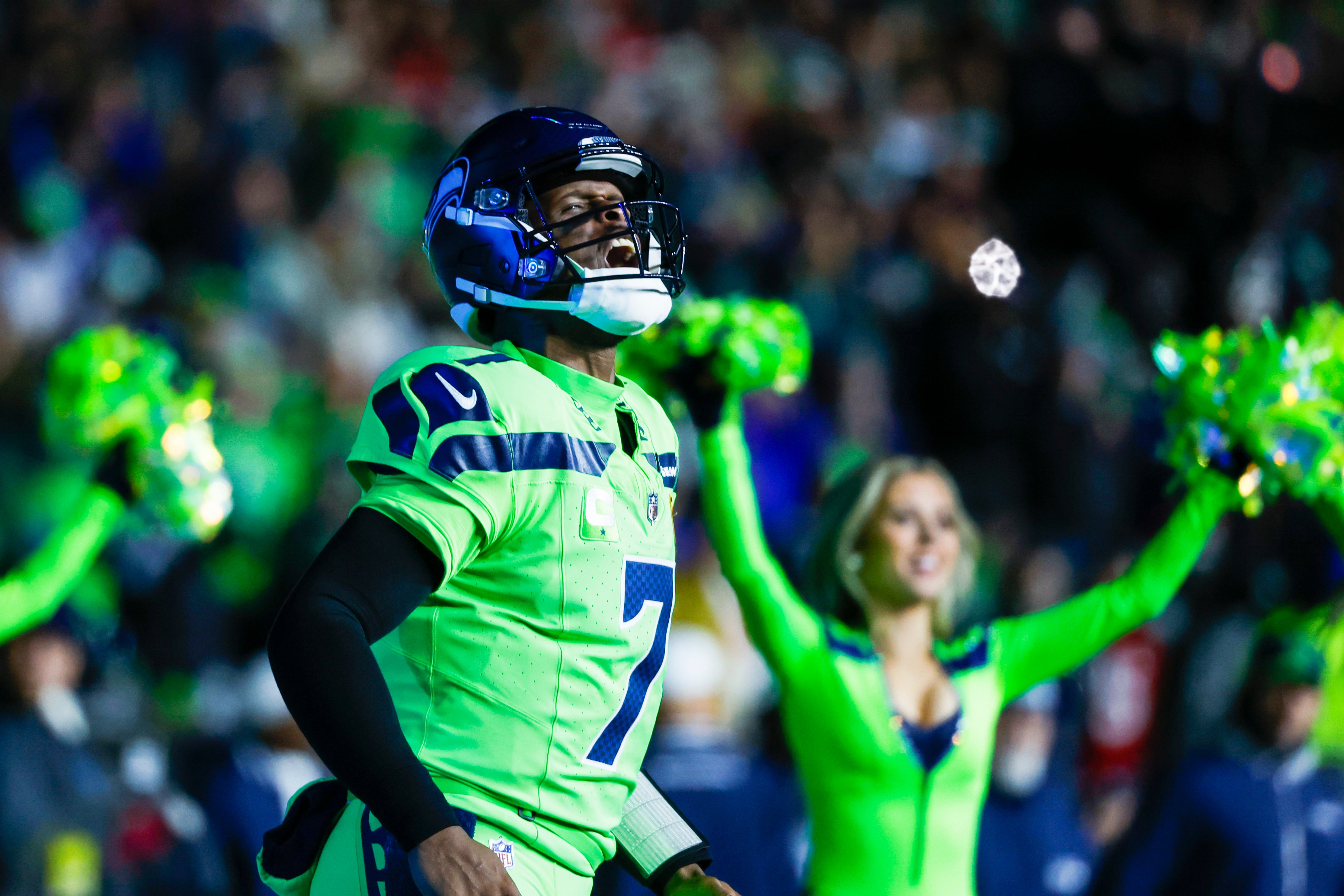Nov 23, 2023; Seattle, Washington, USA; Seattle Seahawks quarterback Geno Smith (7) is introduced before kickoff against the San Francisco 49ers at Lumen Field.