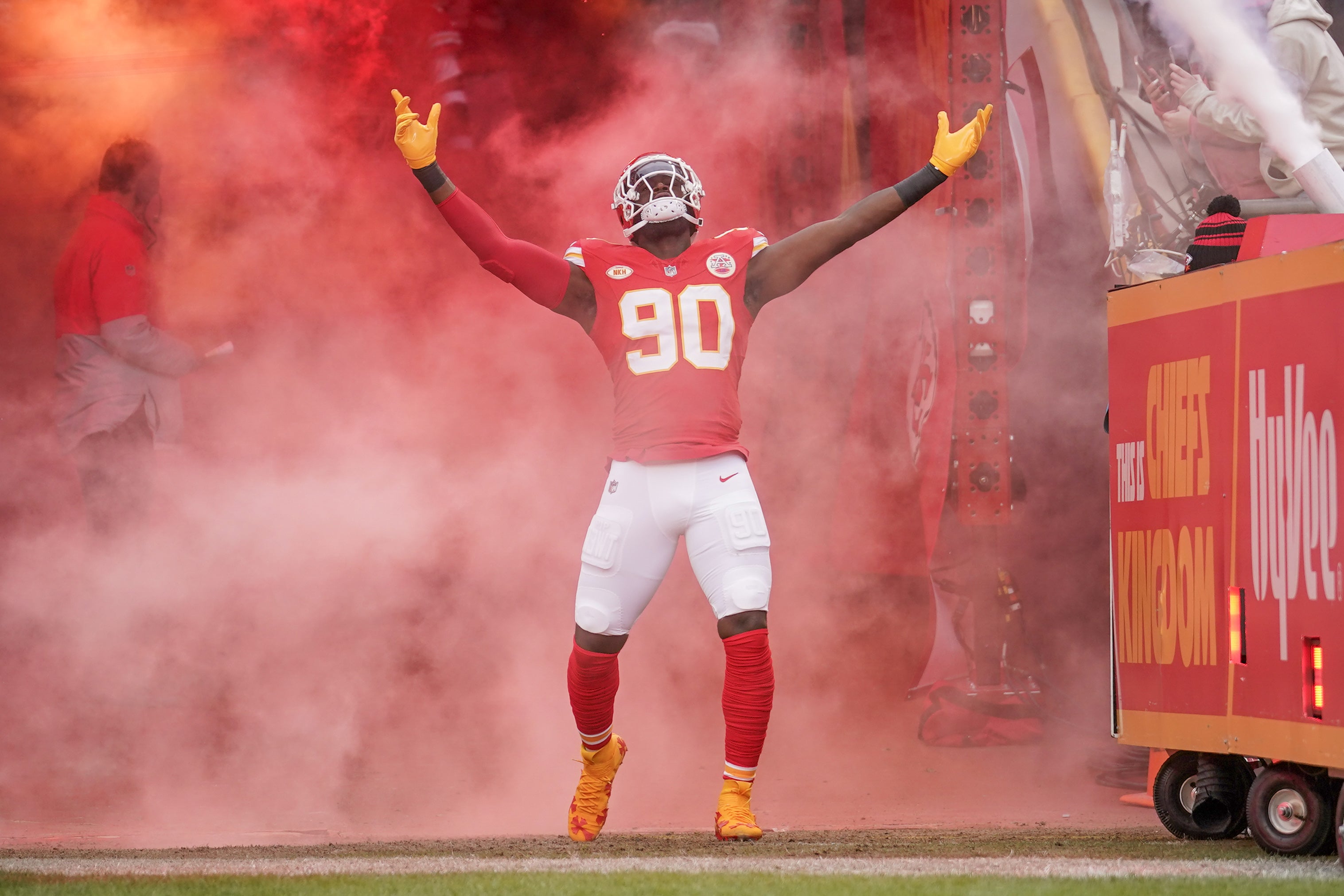 Dec 25, 2023; Kansas City, Missouri, USA; Kansas City Chiefs defensive end Charles Omenihu (90) is introduced against the Las Vegas Raiders prior to a game at GEHA Field at Arrowhead Stadium.