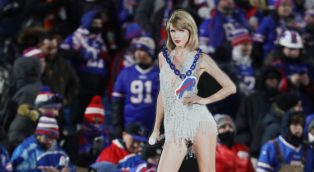 A Bills fan hoists up a poster of Taylor Swift wearing a Buffalo Bills necklace.