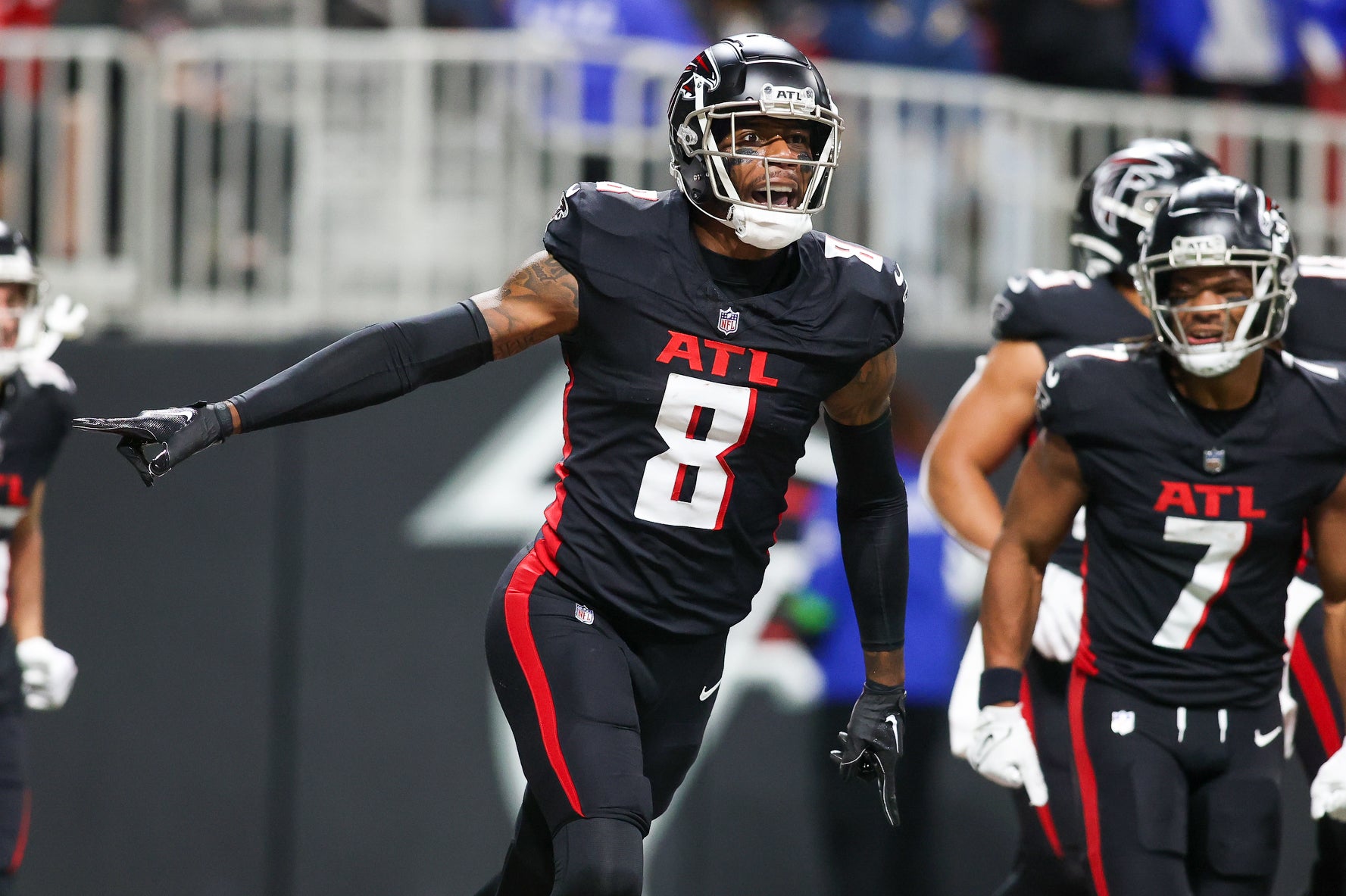 Atlanta Falcons tight end Kyle Pitts (8) celebrates after a touchdown against the Tampa Bay Buccaneers in the first half at Mercedes-Benz Stadium.