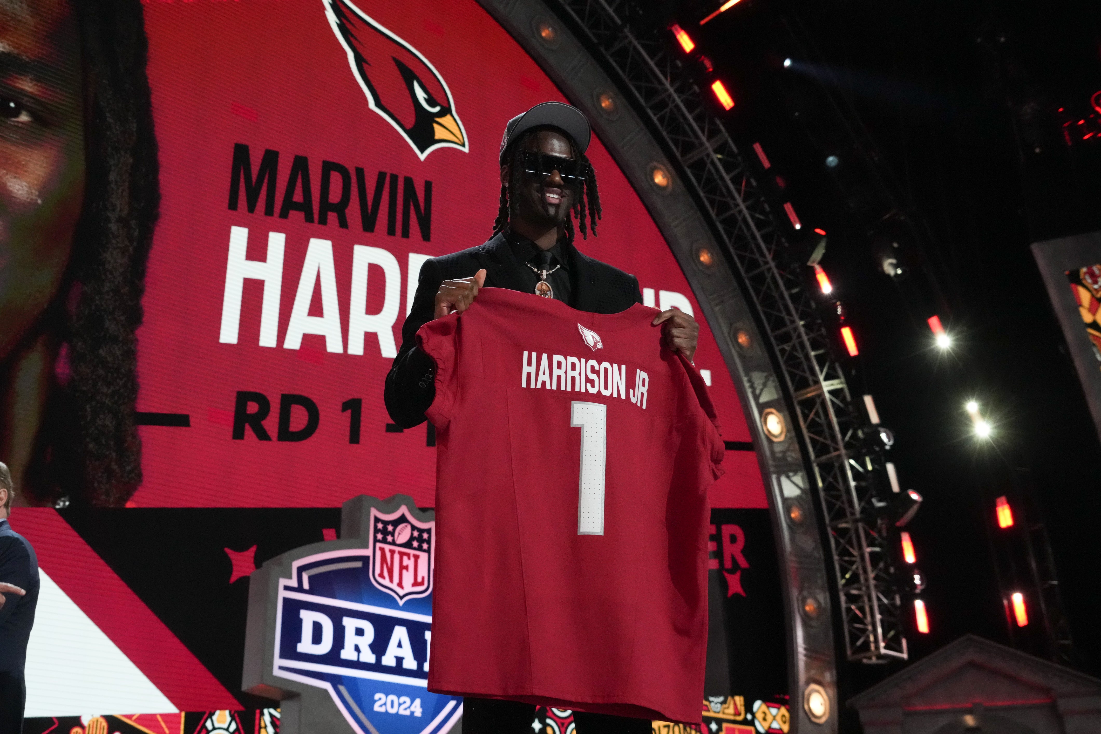 Apr 25, 2024; Detroit, MI, USA; Ohio State Buckeyes wide receiver Marvin Harrison Jr. poses after being selected by the Arizona Cardinals as the No. 4 pick in the first round of the 2024 NFL Draft at Campus Martius Park and Hart Plaza.