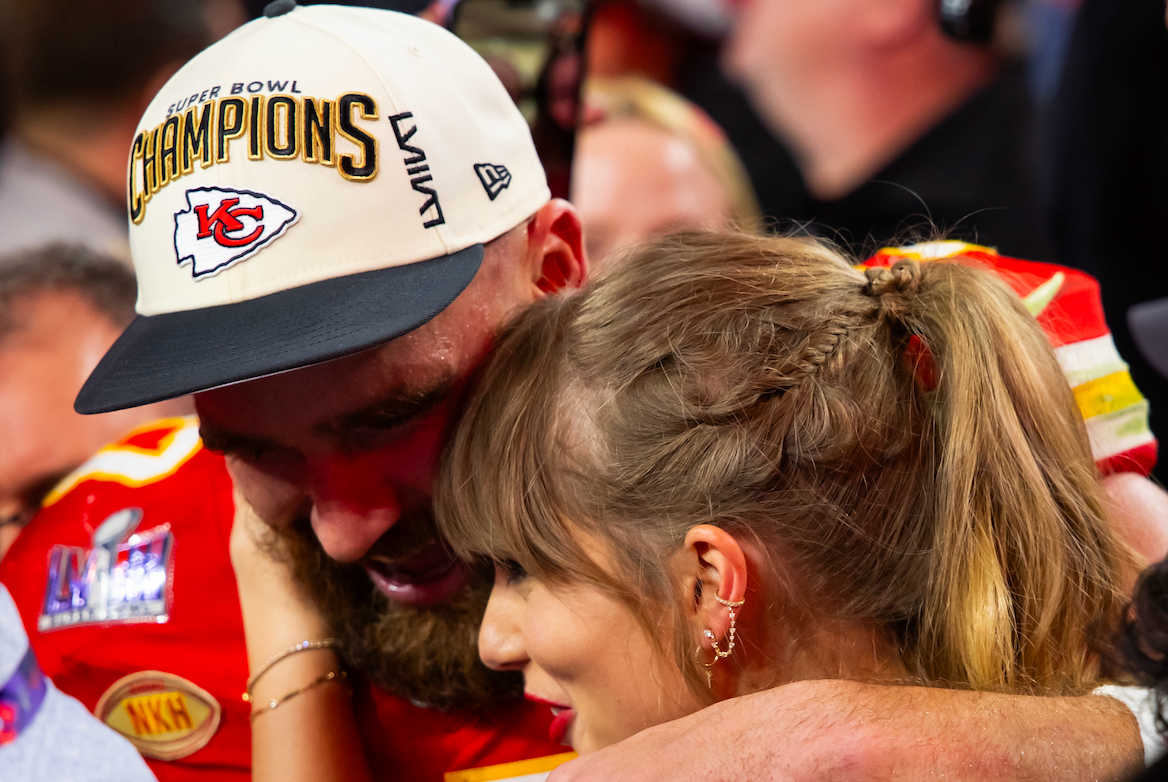 Feb 11, 2024; Paradise, Nevada, USA; Kansas City Chiefs tight end Travis Kelce (87) celebrates with girlfriend Taylor Swift after defeating the San Francisco 49ers in Super Bowl LVIII at Allegiant Stadium.