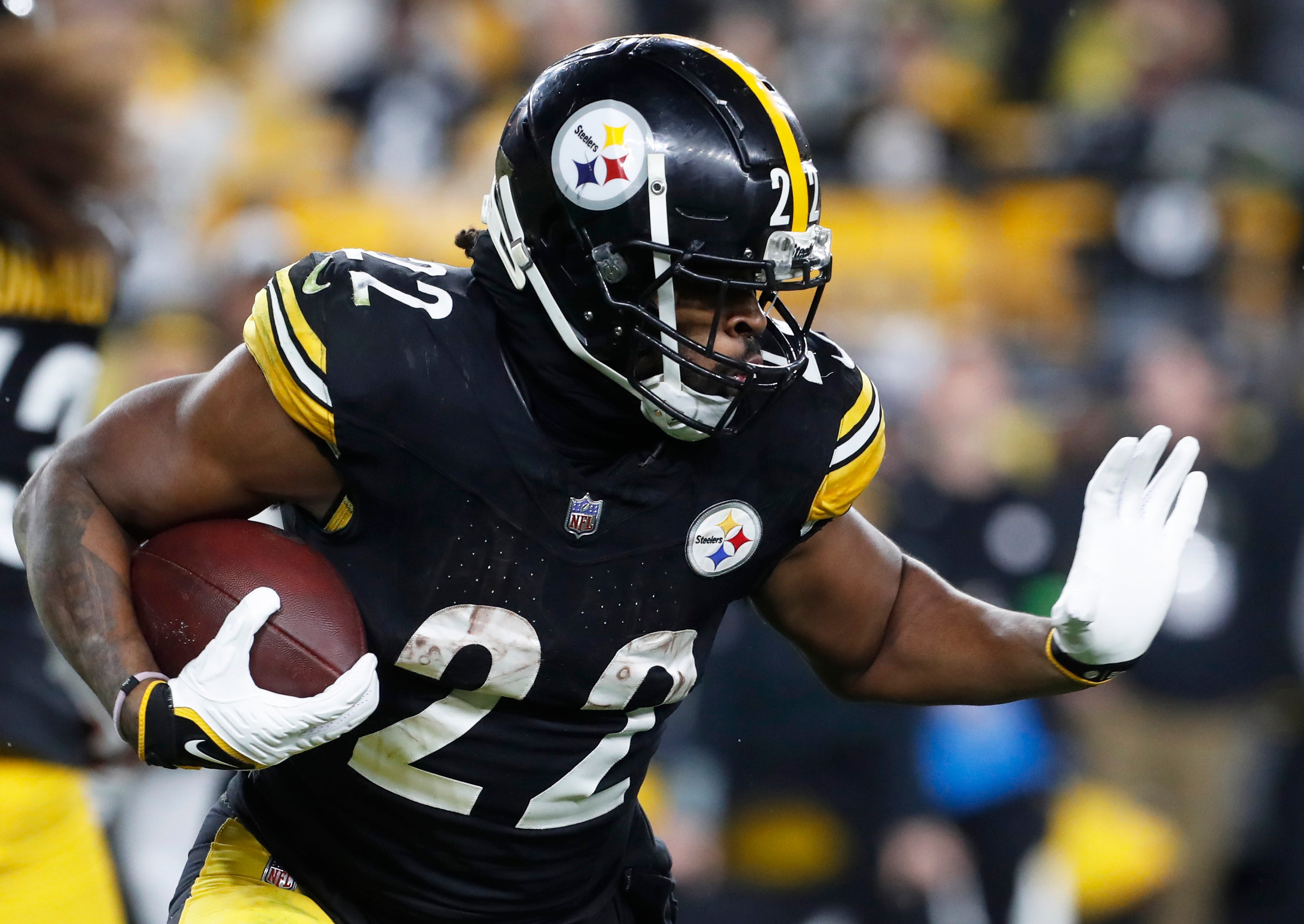 Dec 23, 2023; Pittsburgh, Pennsylvania, USA; Pittsburgh Steelers running back Najee Harris (22) runs the ball against the Cincinnati Bengals during the third quarter at Acrisure Stadium. Pittsburgh won 34-11. Mandatory Credit: Charles LeClaire-USA TODAY Sports