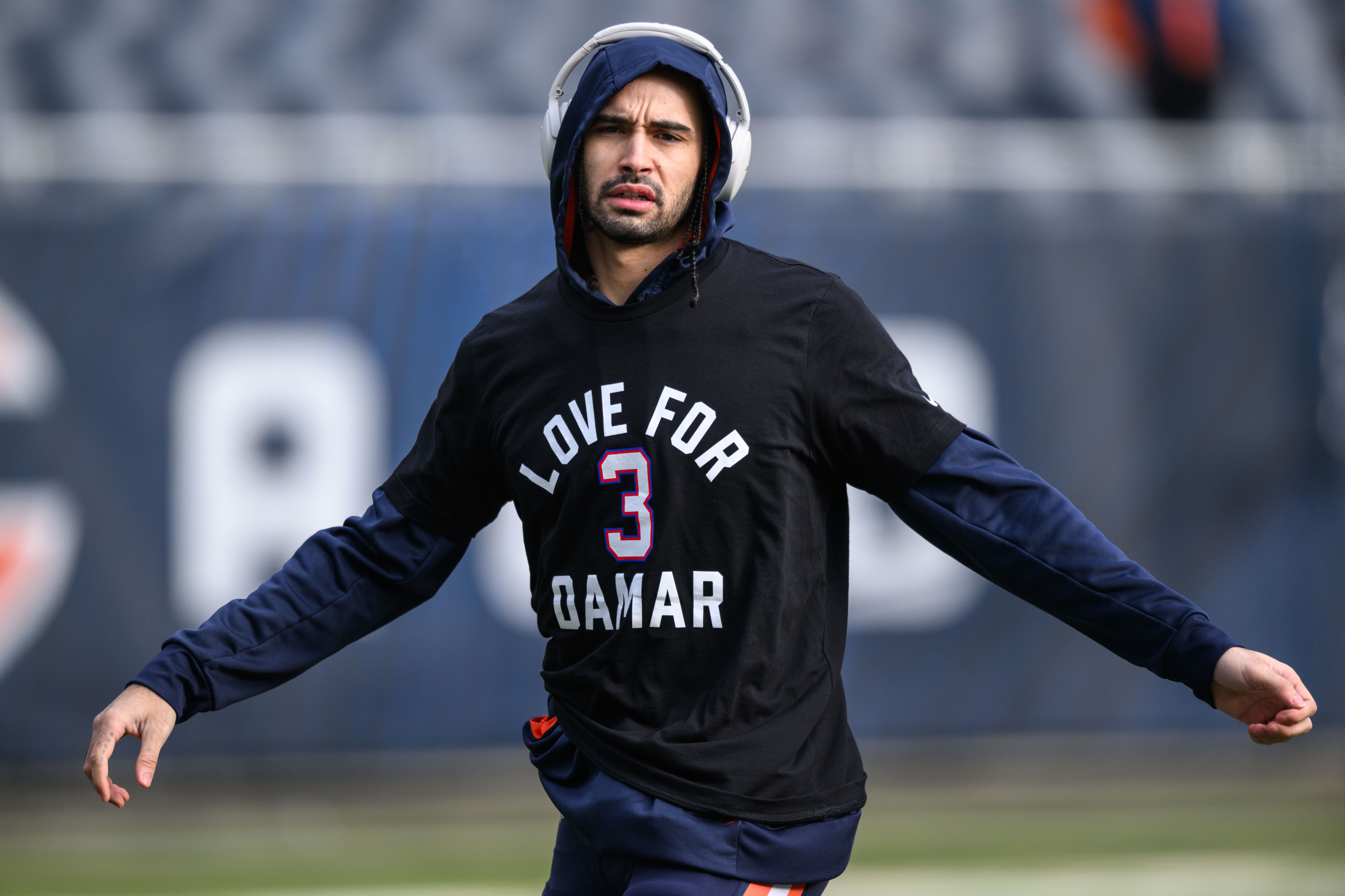 Jan 8, 2023; Chicago, Illinois, USA; Chicago Bears wide receiver Dante Pettis (18) warms up wearing a shirt honoring Buffalo Bills Safety Damar Hamlin (3) before the game against the Minnesota Vikings at Soldier Field.