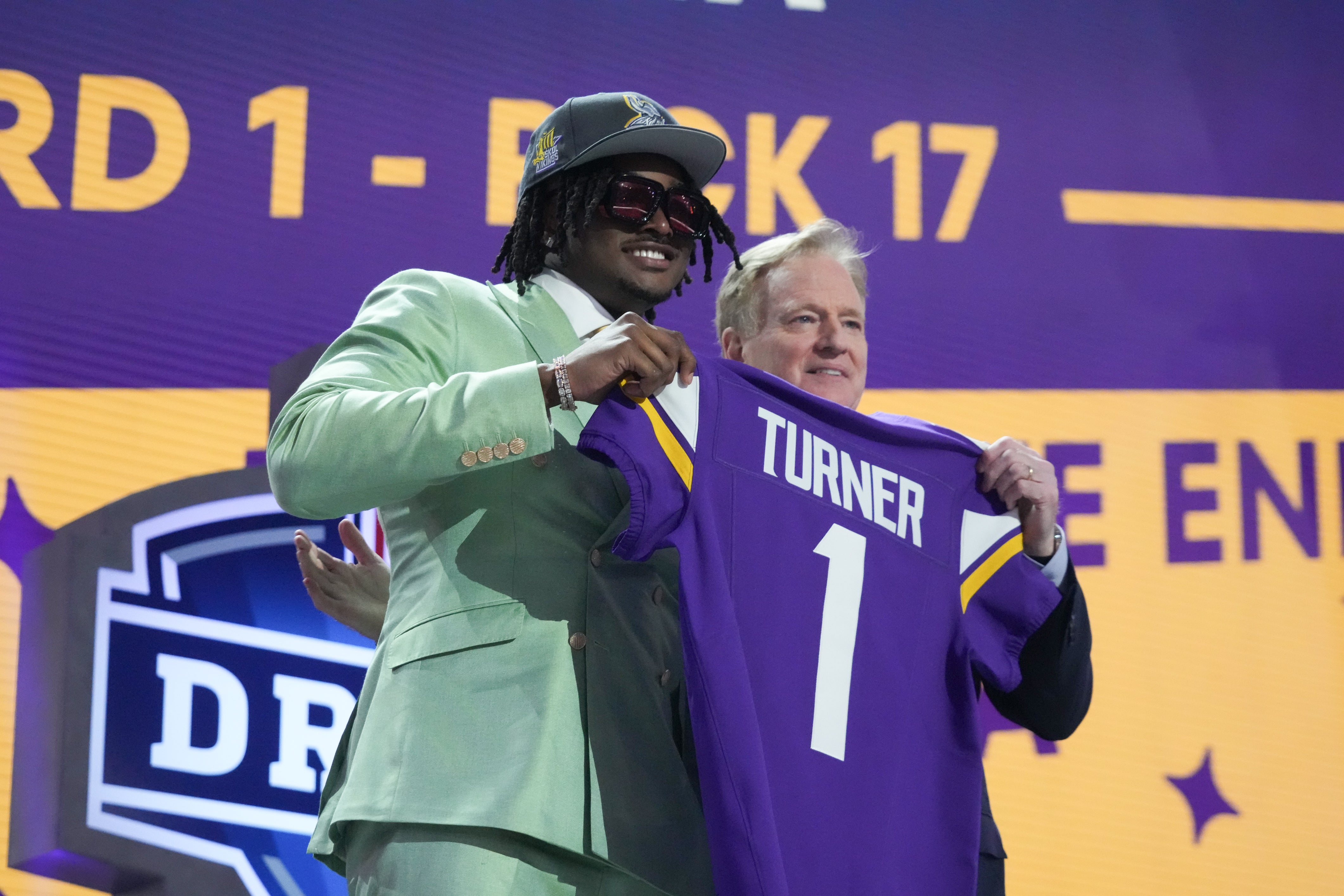 Apr 25, 2024; Detroit, MI, USA; Alabama Crimson Tide linebacker Dallas Turner poses with NFL commissioner Roger Goodell after being selected by the Minnesota Vikings as the No. 17 pick in the first round of the 2024 NFL Draft at Campus Martius Park and Hart Plaza. Mandatory Credit: Kirby Lee-USA TODAY Sports