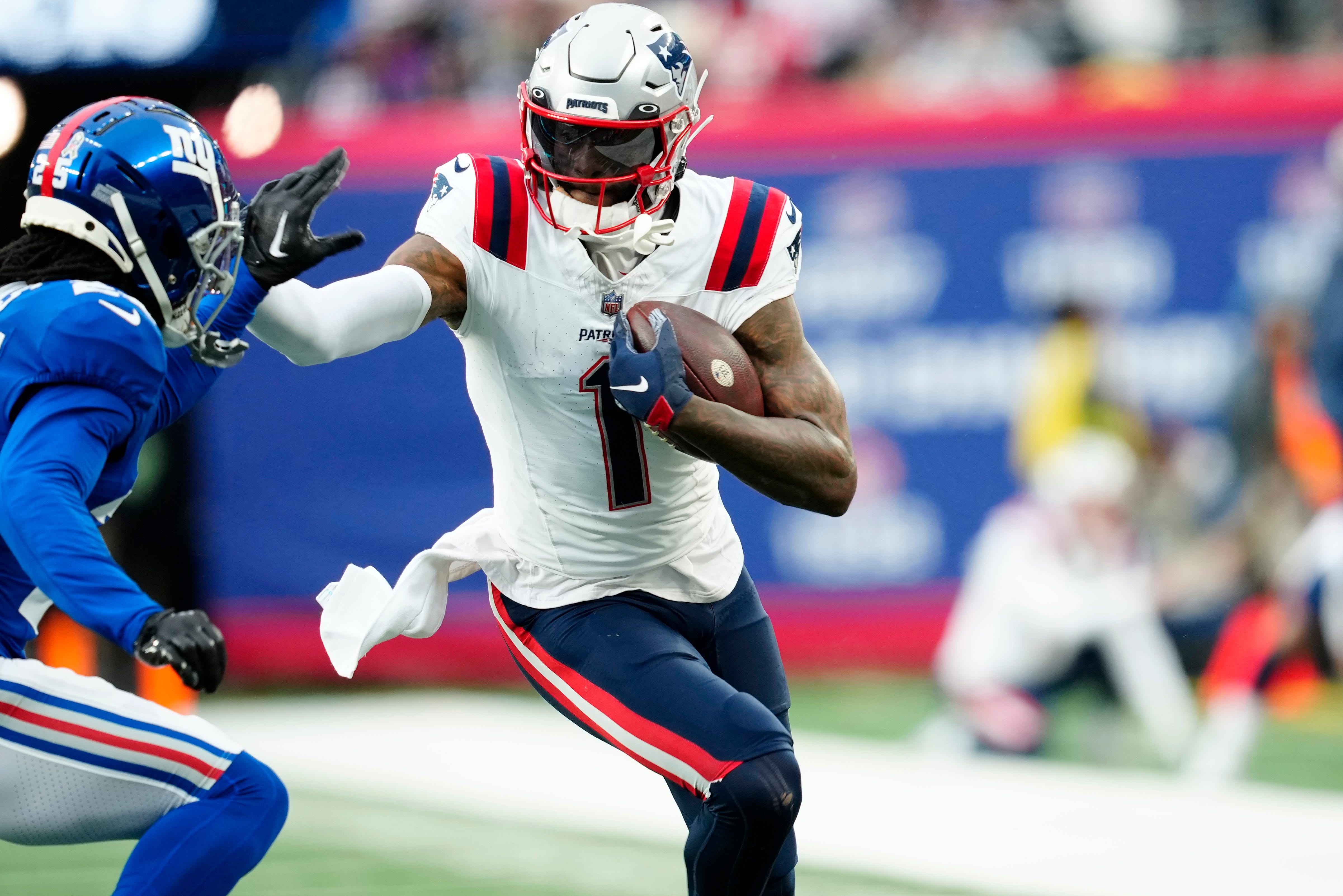 New England Patriots wide receiver DeVante Parker (1) tries push off New York Giants cornerback Deonte Banks (25) at MetLife Stadium, Sunday, November 26, 2023 Kevin R.