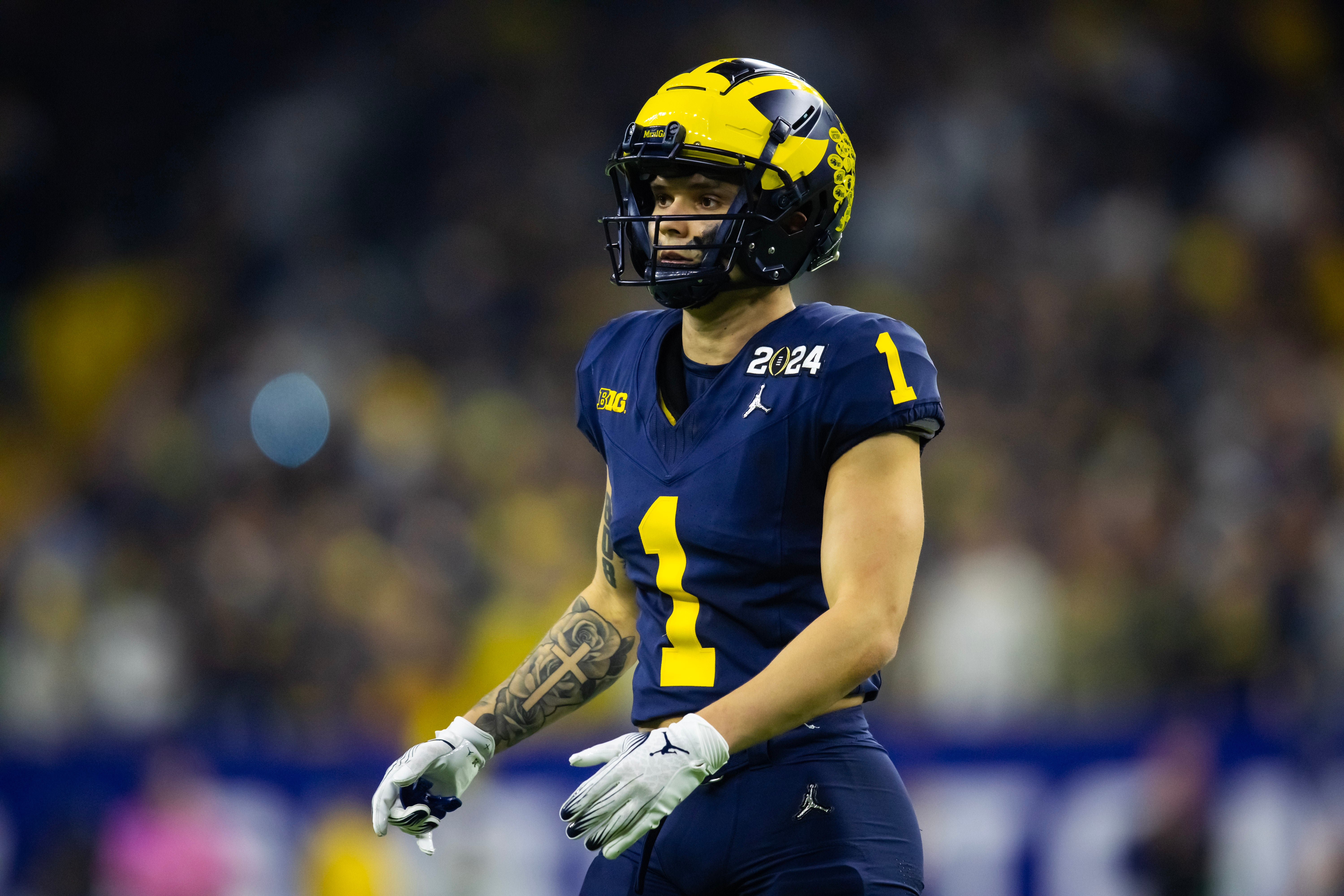 Jan 8, 2024; Houston, TX, USA; Michigan Wolverines wide receiver Roman Wilson (1) against the Washington Huskies during the 2024 College Football Playoff national championship game at NRG Stadium. Mandatory Credit: Mark J. Rebilas-USA TODAY Sports
