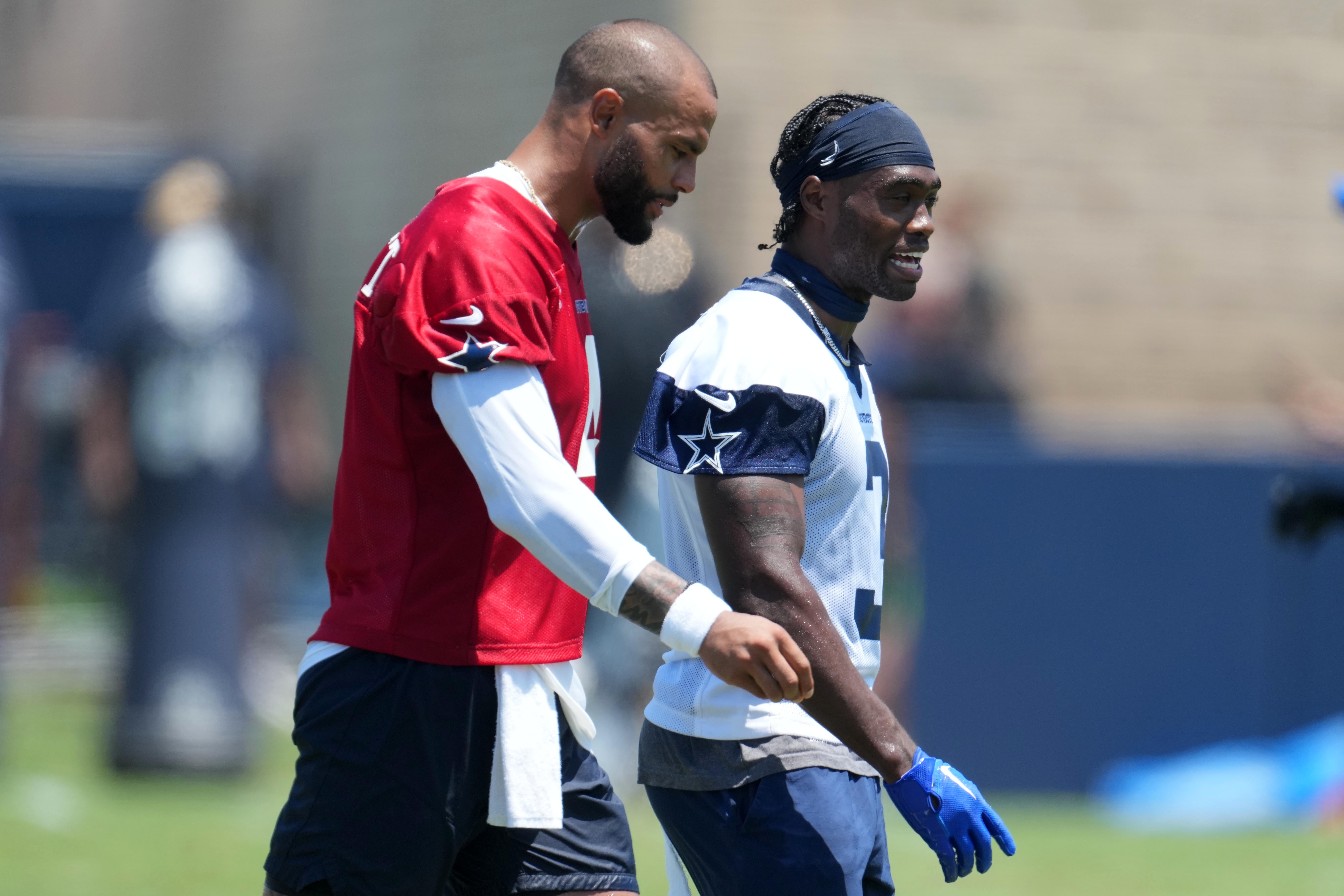 Dallas Cowboys quarterback Dak Prescott (4) and wide receiver Brandin Cooks (3) during training camp at the River Ridge Fields.