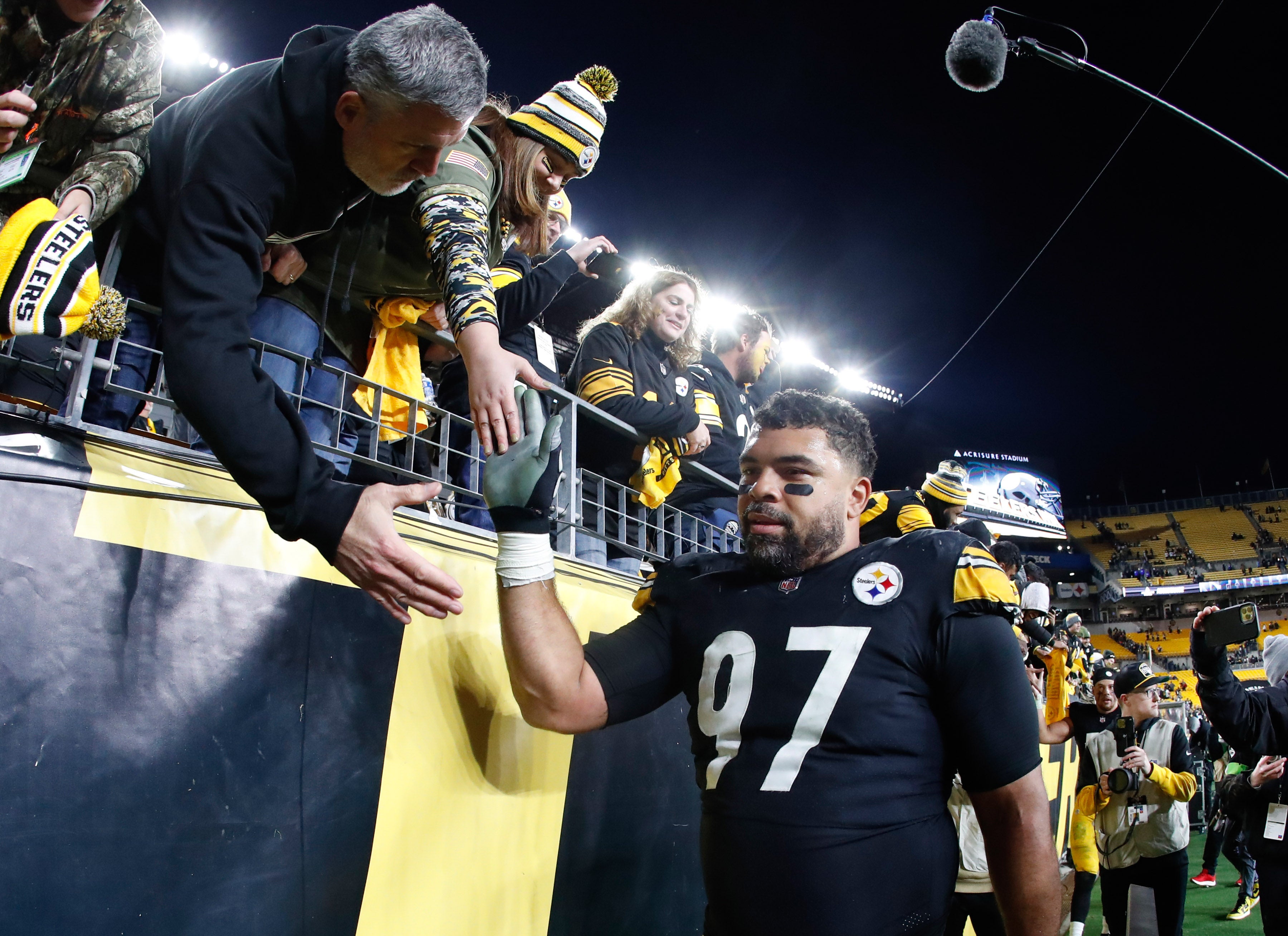 Nov 2, 2023; Pittsburgh, Pennsylvania, USA; Pittsburgh Steelers defensive tackle Cameron Heyward (97) greets fans after defeating the Tennessee Titans at Acrisure Stadium. Mandatory Credit: Charles LeClaire-USA TODAY Sports