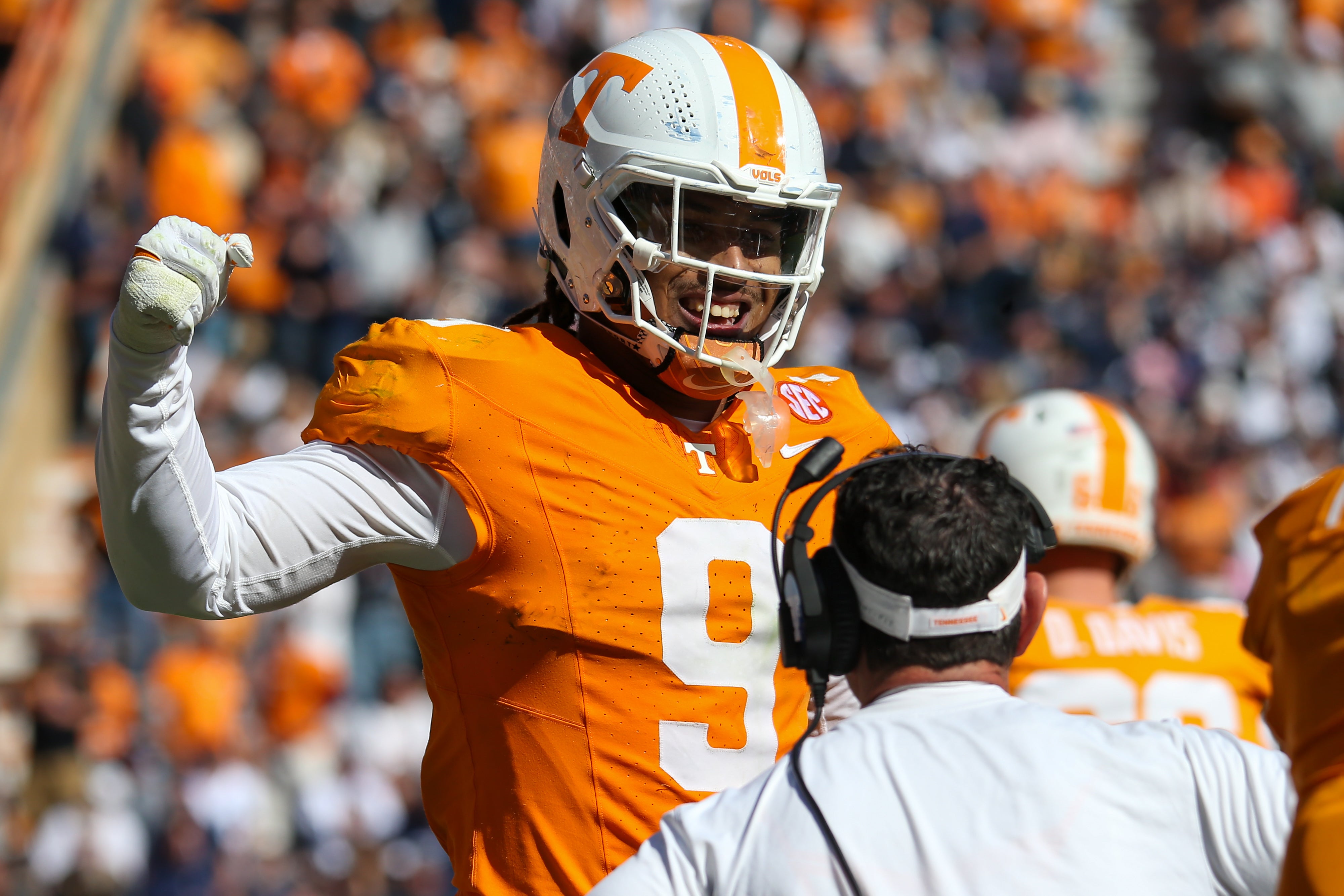Nov 4, 2023; Knoxville, Tennessee, USA; Tennessee Volunteers defensive lineman Tyler Baron (9) celebrates after returning a fumble for a touchdown against the Connecticut Huskies during the first half at Neyland Stadium.