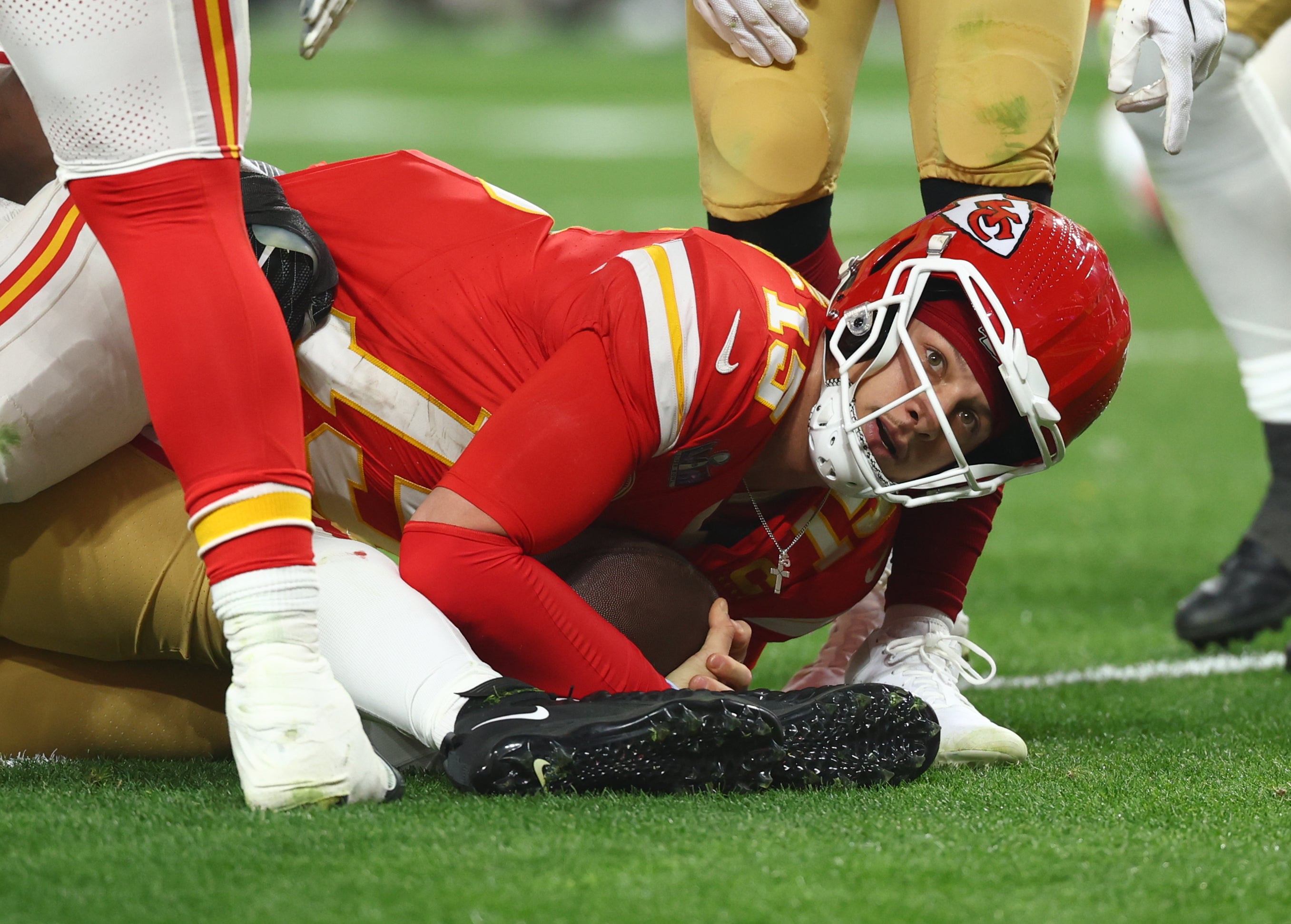 Feb 11, 2024; Paradise, Nevada, USA; Kansas City Chiefs quarterback Patrick Mahomes (15) reacts against the San Francisco 49ers in the fourth quarter in Super Bowl LVIII at Allegiant Stadium.