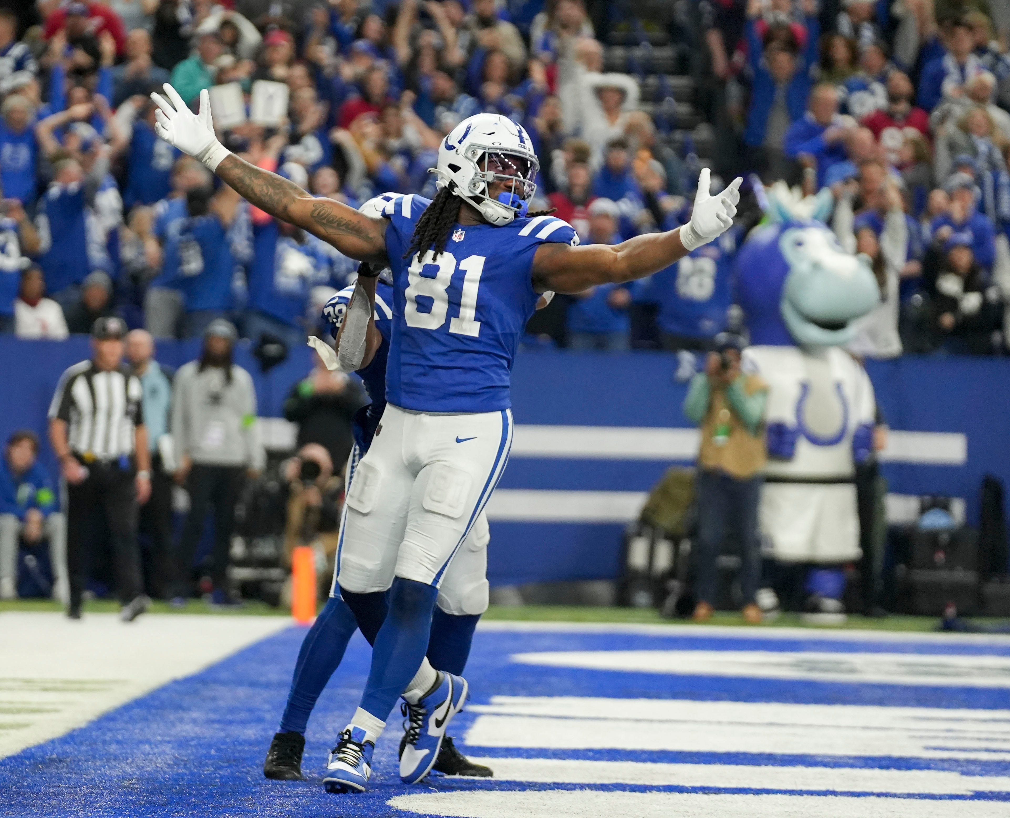 Indianapolis Colts tight end Mo Alie-Cox (81) reacts after making a catch for a two-point conversion Saturday, Jan. 6, 2024, during a game against the Houston Texans at Lucas Oil Stadium in Indianapolis.