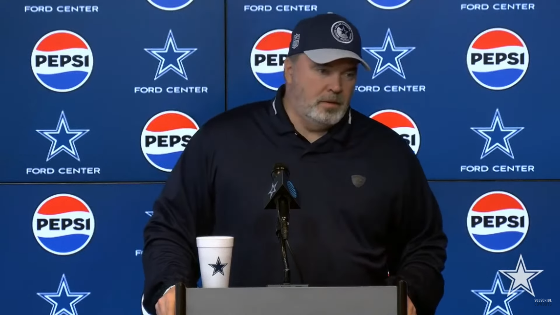 Dallas Cowboys HC Mike McCarthy talks to reporters in during second day of OTAs.