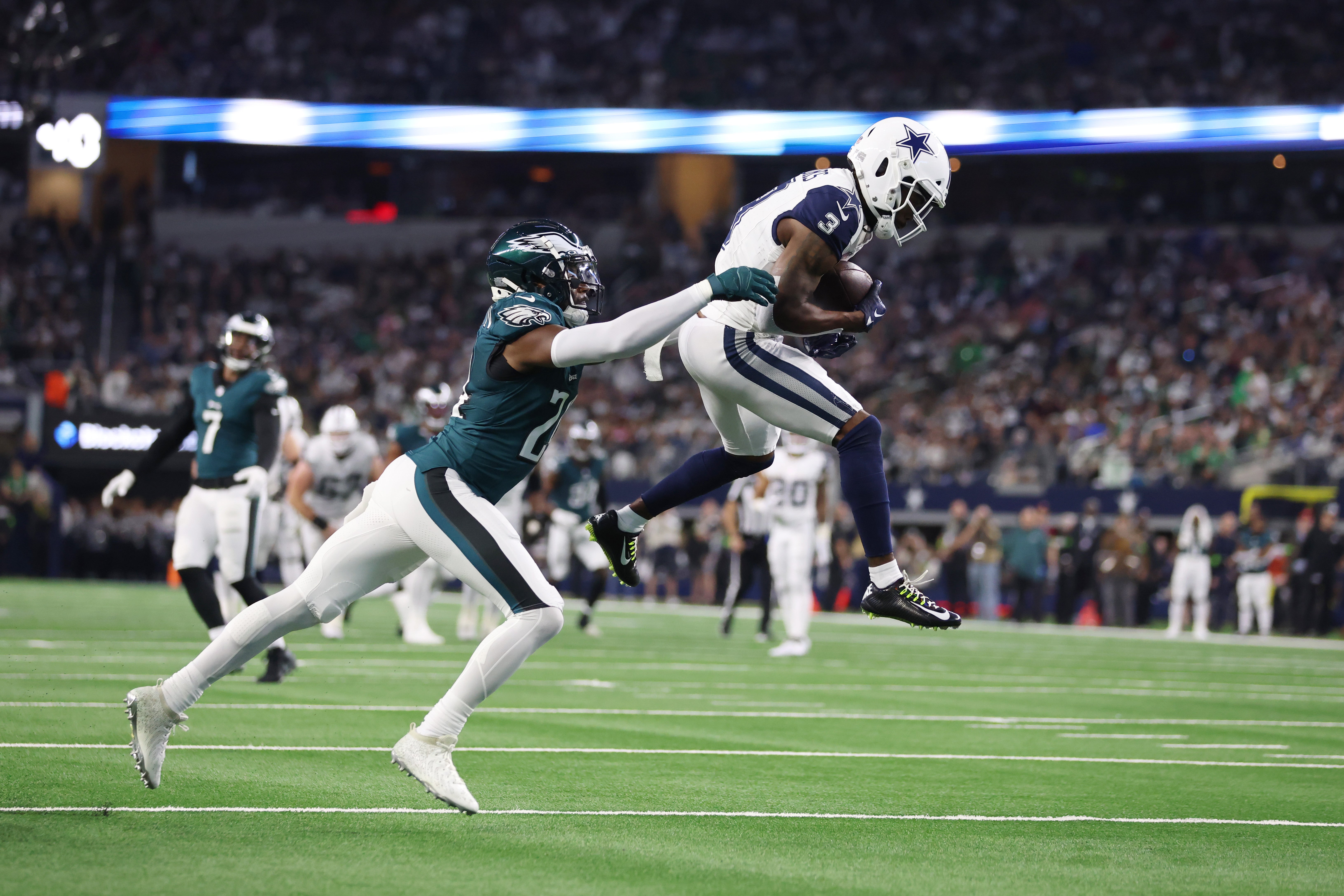 Dallas Cowboys wide receiver Brandin Cooks (3) catches a pass against Philadelphia Eagles cornerback James Bradberry (24) in the second quarter at AT&T Stadium.
