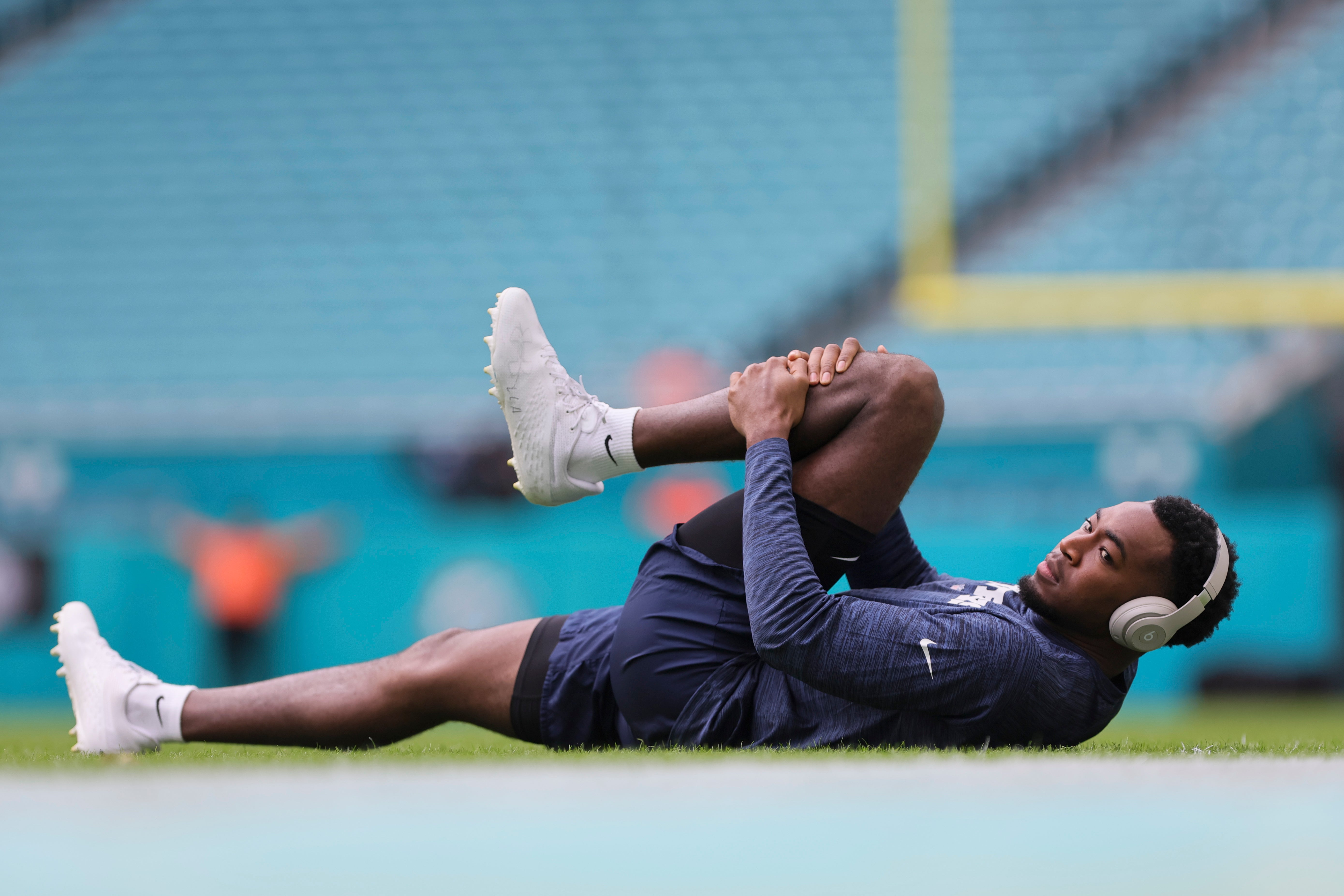 Dallas Cowboys wide receiver Jalen Brooks (83) stretches prior to the game against the Miami Dolphins at Hard Rock Stadium.