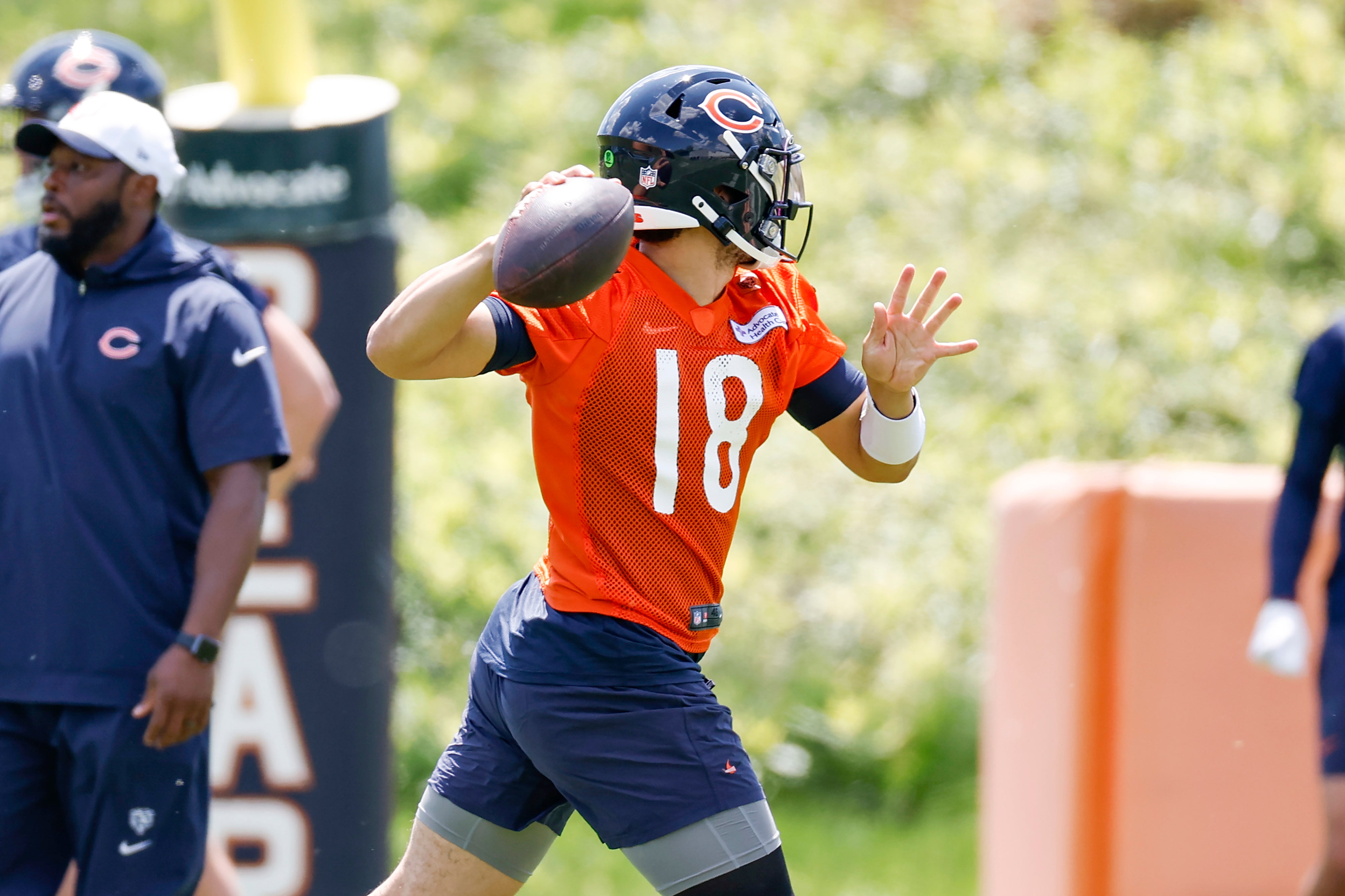 May 23, 2024; Lake Forest, IL, USA; Chicago Bears quarterback Caleb Williams (18) throws the ball during organized team activities at Halas Hall.