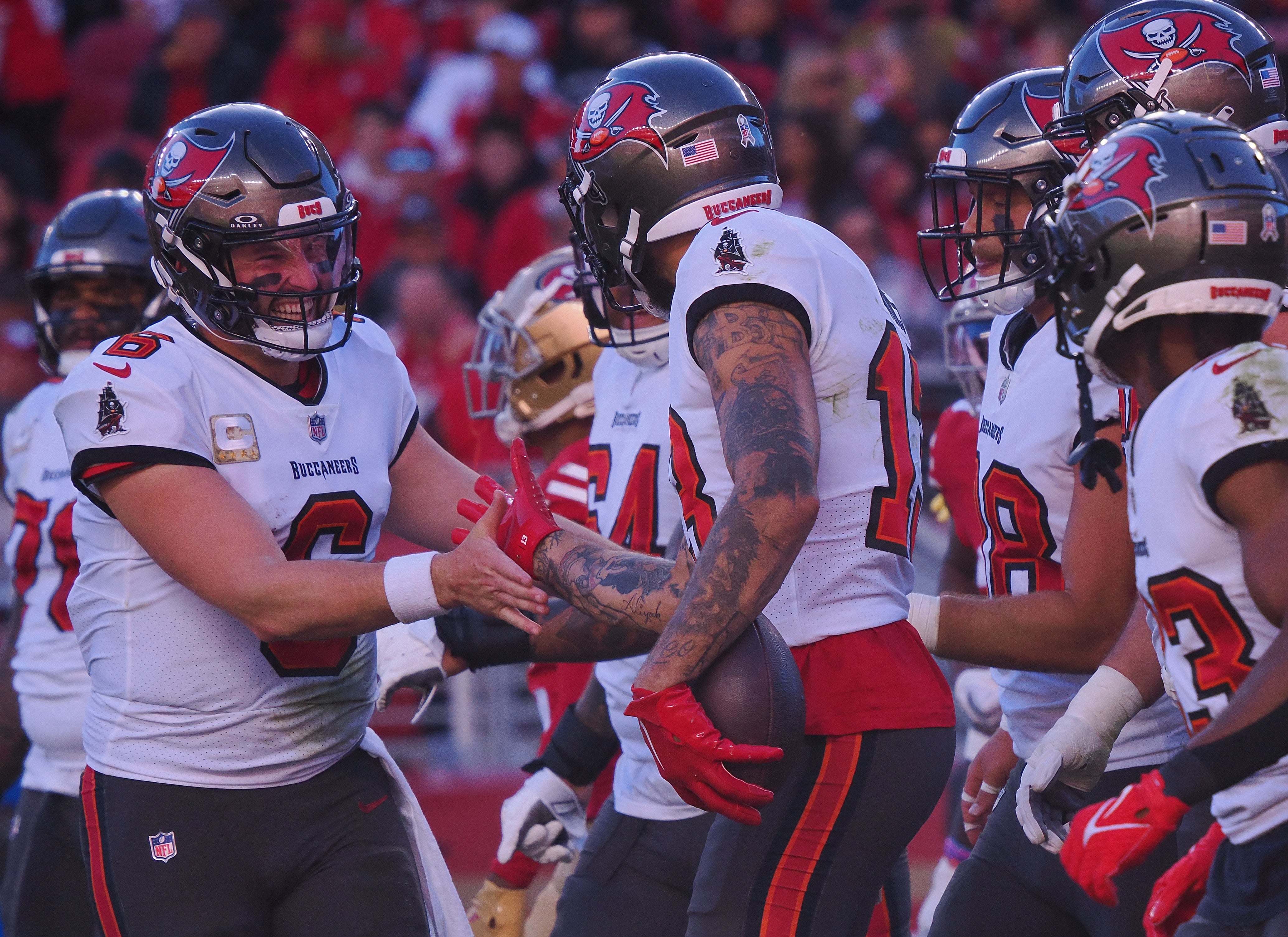 Nov 19, 2023; Santa Clara, California, USA; Tampa Bay Buccaneers quarterback Baker Mayfield (6) celebrates with wide receiver Mike Evans (13) after Evan s touchdown reception against the San Francisco 49ers during the second quarter at Levi's Stadium.