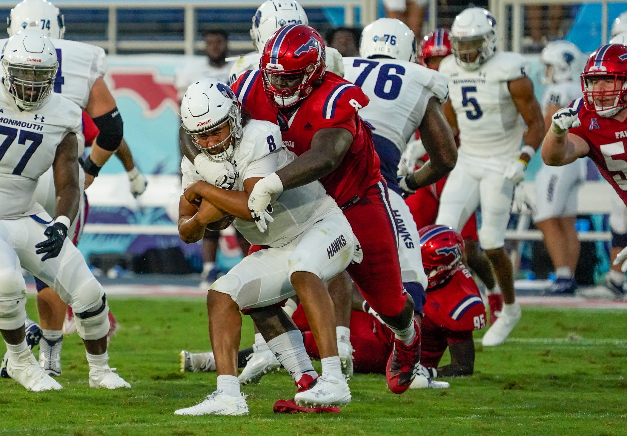 Florida Atlantic defensive tackle Evan Anderson (8) sacks the Monmouth quarterback in the second quarter at FAU Stadium on Saturday, September 2, 2023, in Boca Raton, FL.
