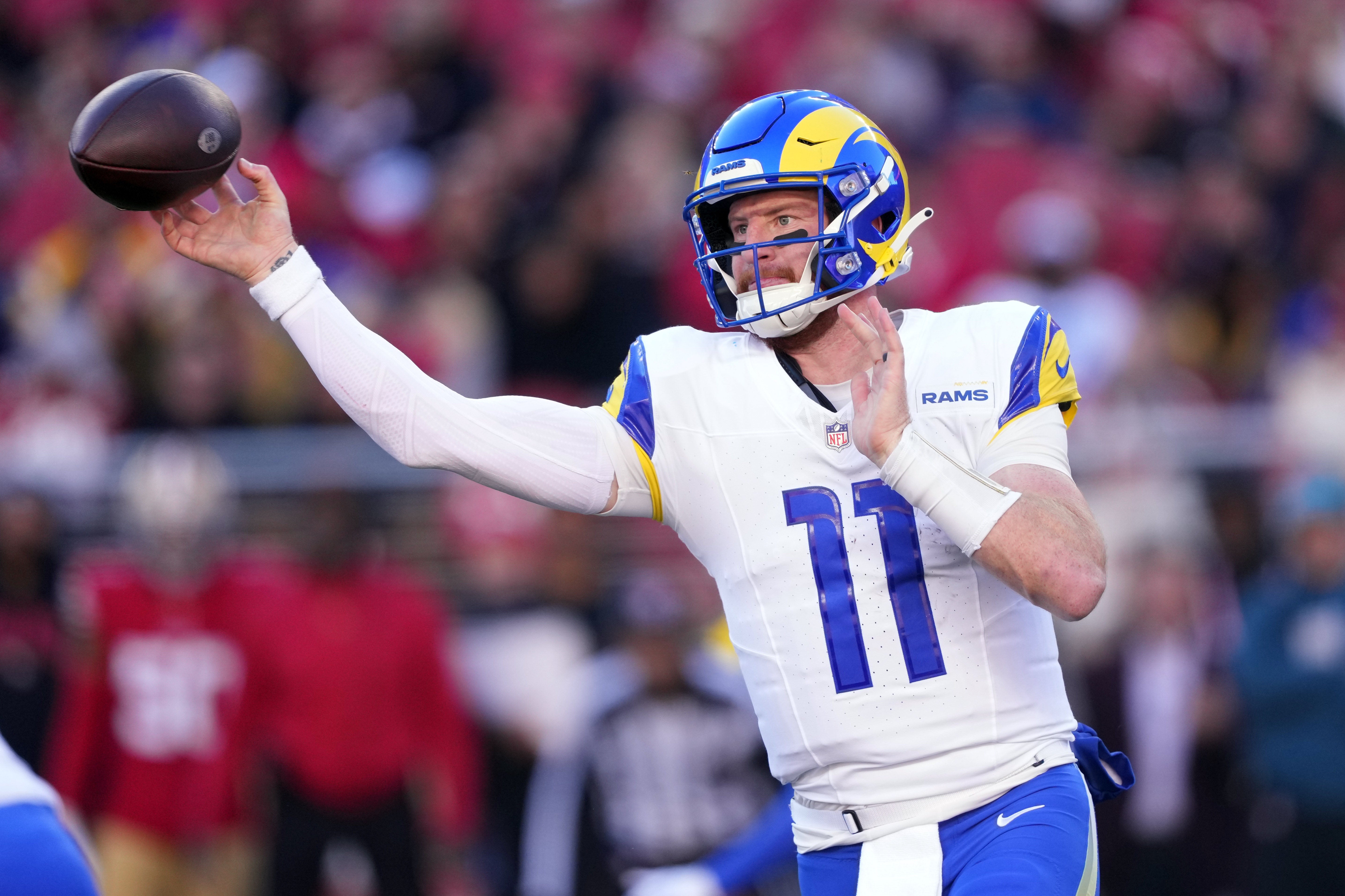 Jan 7, 2024; Santa Clara, California, USA; Los Angeles Rams quarterback Carson Wentz (11) throws a pass against the San Francisco 49ers during the second quarter at Levi's Stadium.