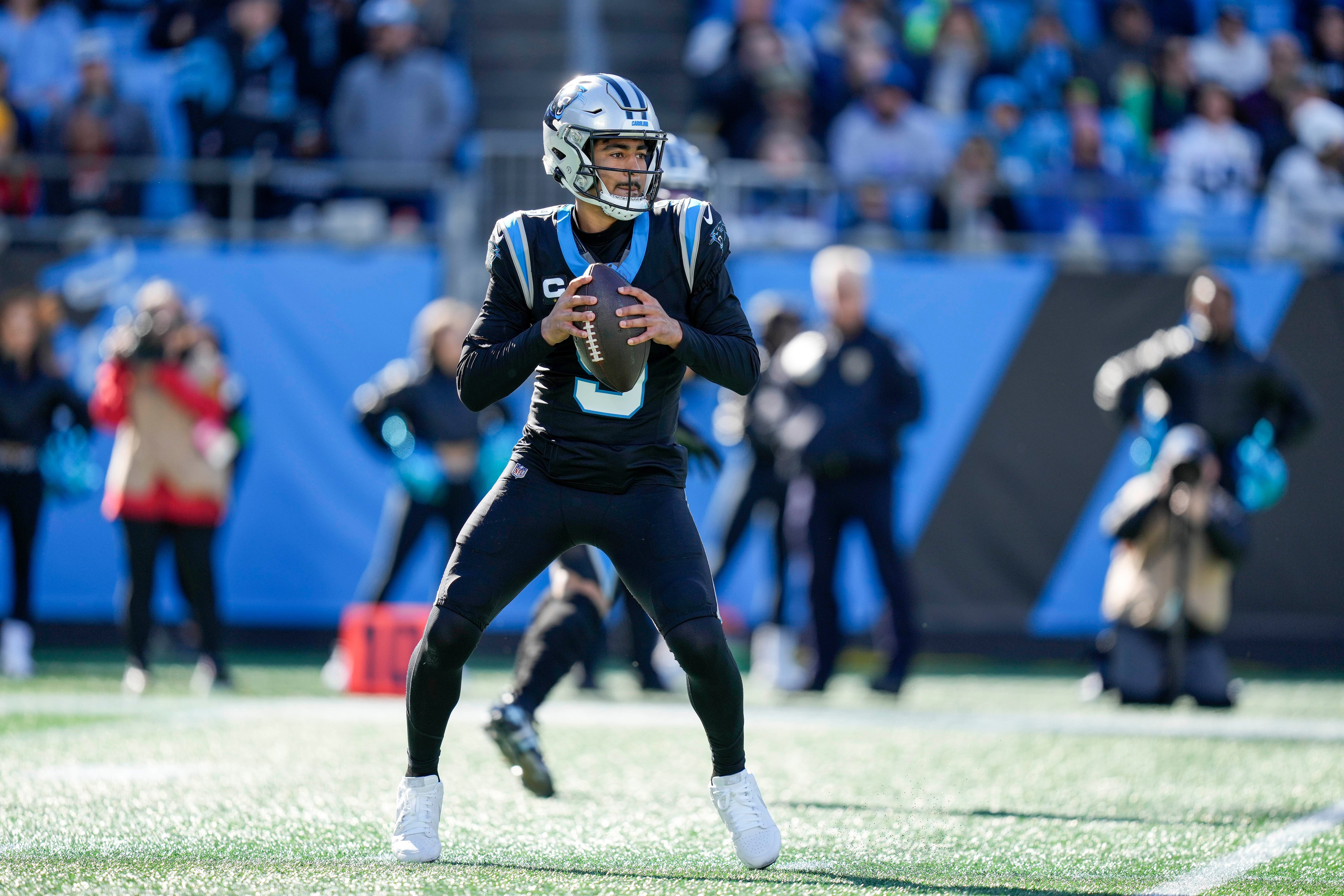 Jan 7, 2024; Charlotte, North Carolina, USA; Carolina Panthers quarterback Bryce Young (9) drops back to pass against the Tampa Bay Buccaneers during the first quarter at Bank of America Stadium. Mandatory Credit: Jim Dedmon-USA TODAY Sports
