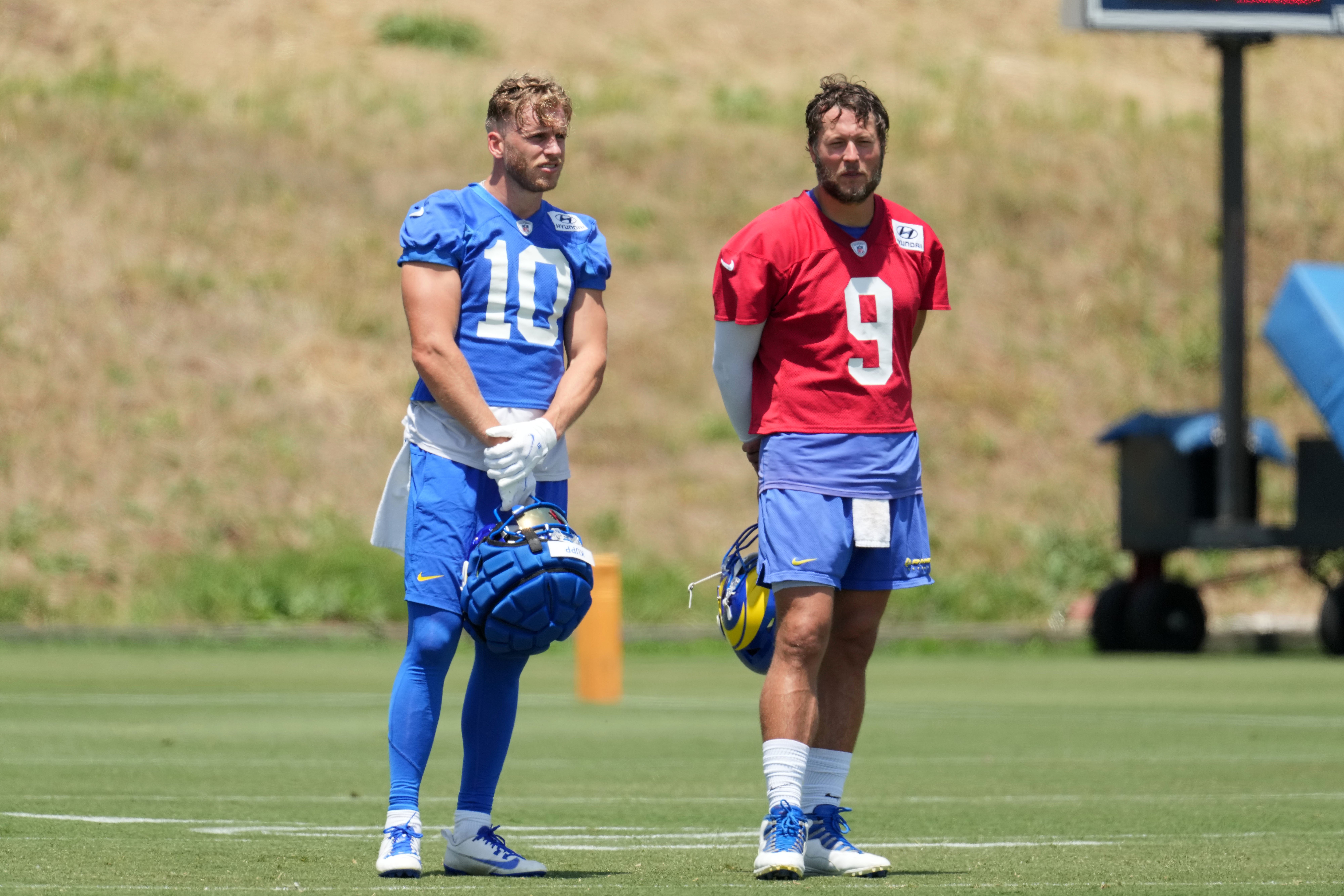 May 21, 2024, Thousand Oaks, California, USA; Los Angeles Rams wide receiver Cooper Kupp (10) and quarterback Matthew Stafford (9) during organized team activities at Cal Lutheran University. Mandatory Credit: Kirby Lee-USA TODAY Sports