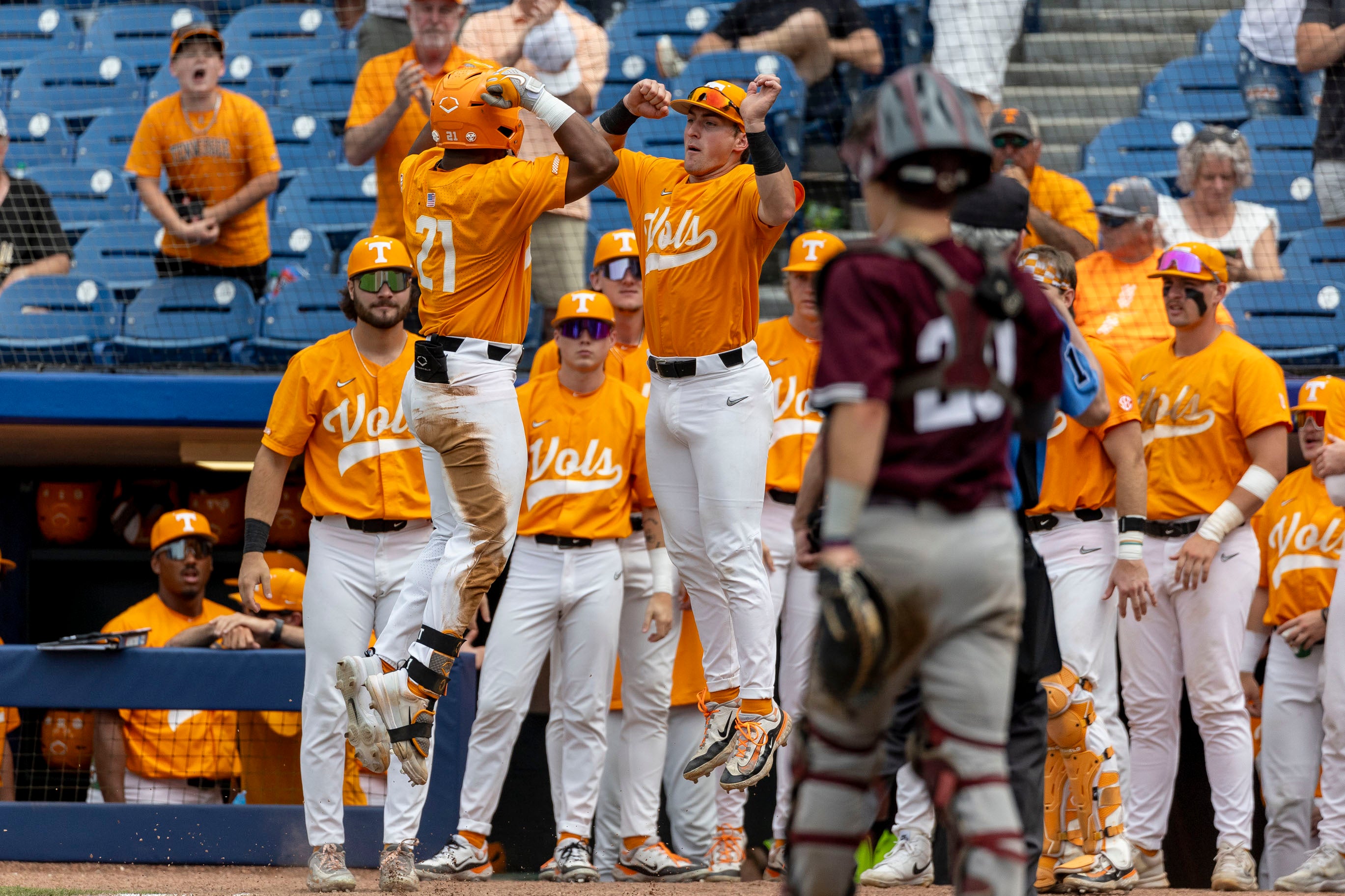 May 23, 2024; Hoover, AL, USA; Tennessee Volunteers outfielder Kavares Tears (21) celebrates his three-run home run with teammates during a game against the Texas A&M Aggies at the SEC Baseball Tournament at Hoover Metropolitan Stadium.