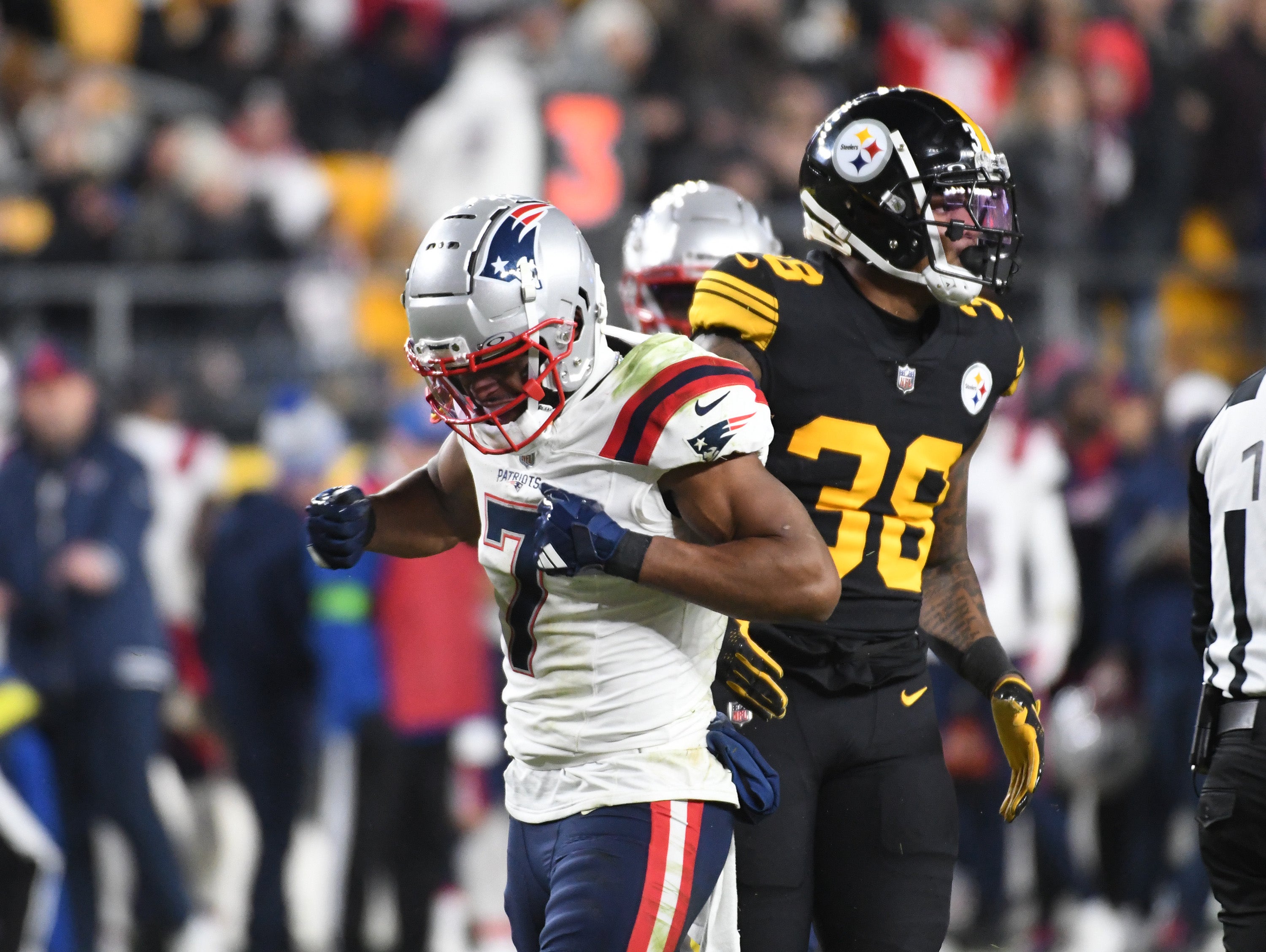 Dec 7, 2023; Pittsburgh, Pennsylvania, USA; New England Patriots wide receiver JuJu Smith-Schuster (7) celebrates a first down against the Pittsburgh Steelers during the second quarter at Acrisure Stadium. Mandatory Credit: Philip G. Pavely-USA TODAY Sports