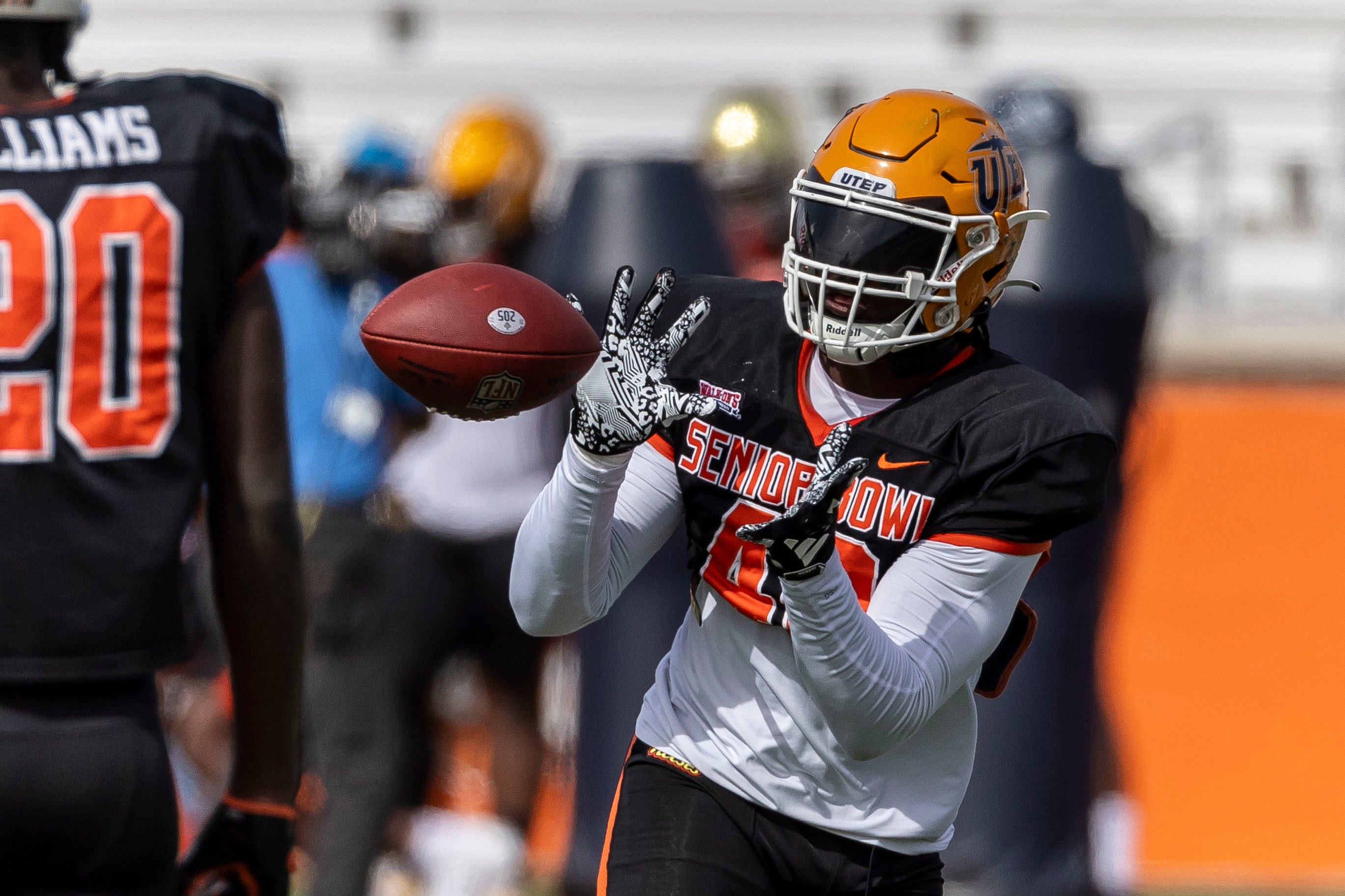 Feb 1, 2024; Mobile, AL, USA; American linebacker Tyrice Knight of UTEP (40) grabs an interception in drills during practice for the American team at Hancock Whitney Stadium.