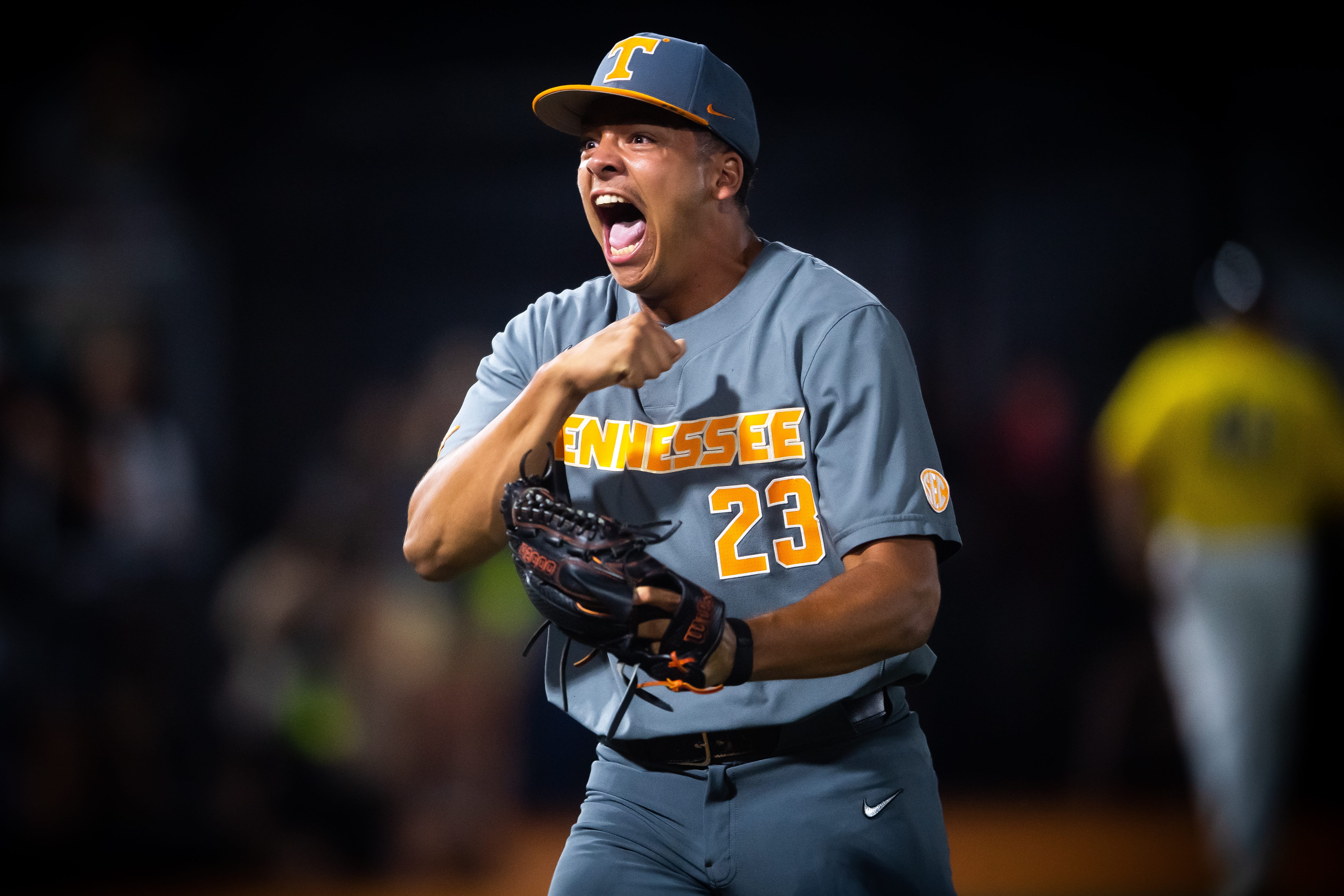 Tennessee pitcher Chase Burns (23) does a throat-slashing gesture while celebrating an inning-ending strikeout during game three of the NCAA baseball super regional between Tennessee and Southern Mississippi held at Pete Taylor Park in Hattiesburg, Miss., on Monday, June 12, 2023. Tennessee defeated Southern Miss 5-0 to earn a trip to the College World Series in Omaha.