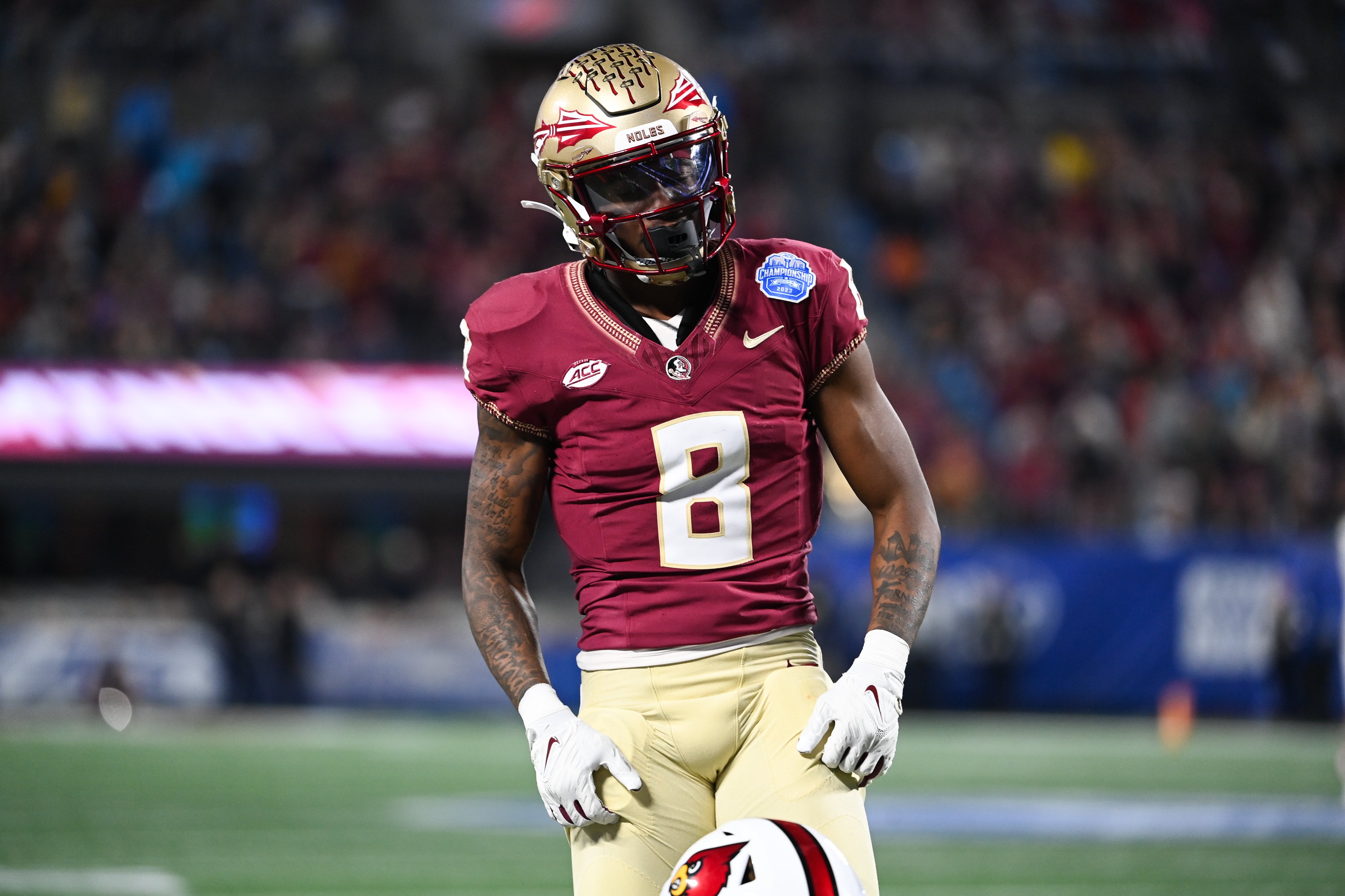 Dec 2, 2023; Charlotte, NC, USA; Florida State Seminoles defensive back Renardo Green (8) reacts after breaking up a pass in the third quarter against the Louisville Cardinals at Bank of America Stadium.